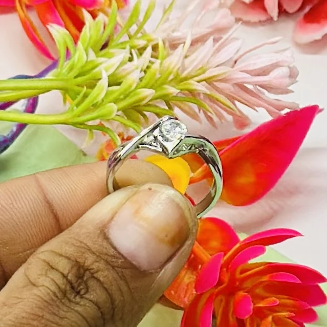 silver solitaire ring featuring a Swiss zirconia stone.
