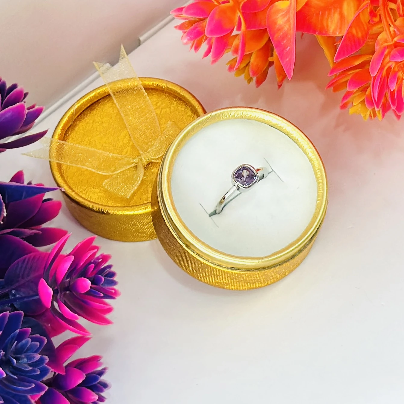 An adjustable sterling silver ring