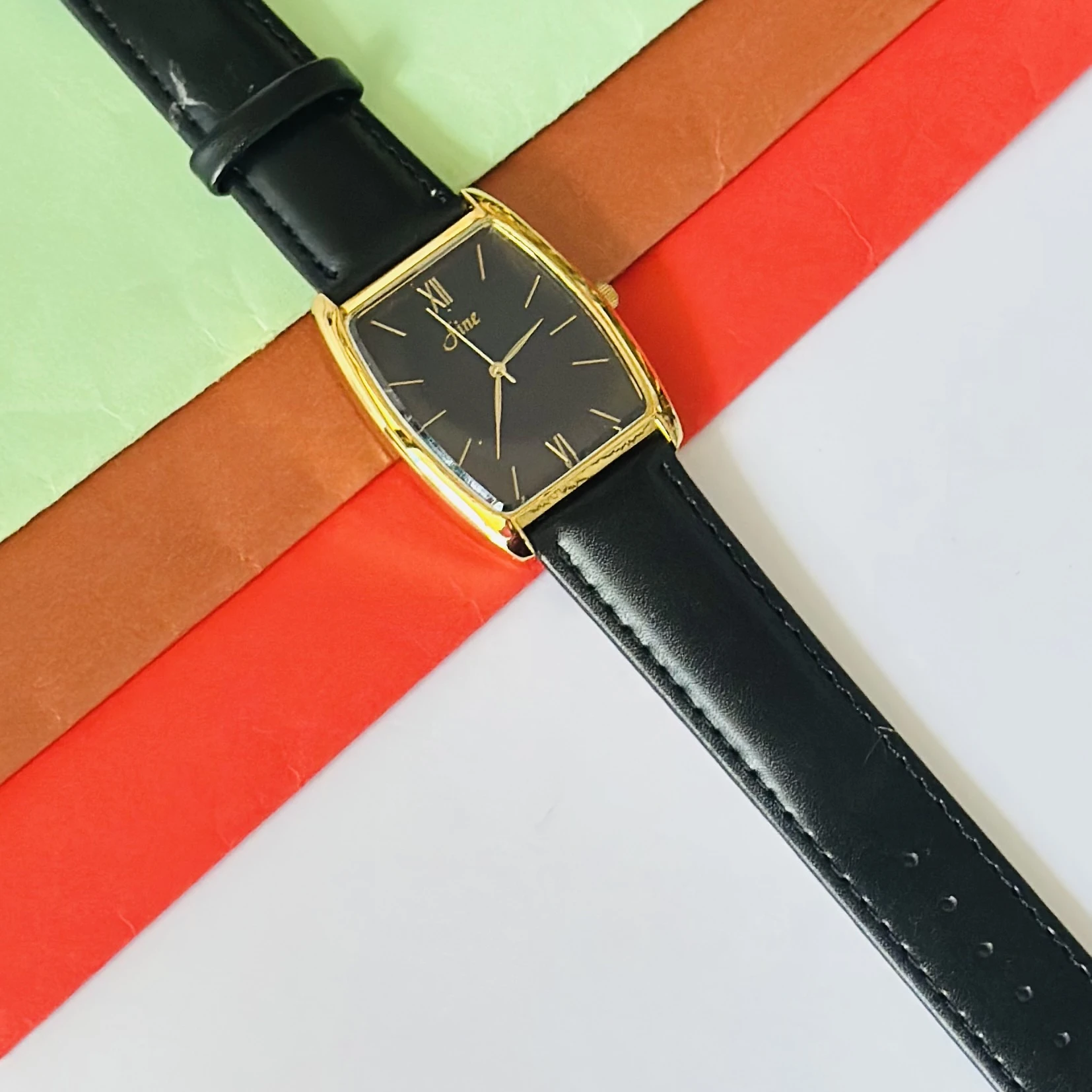 Regalia Opulent analog watch for men with a black dial and black leather strap.