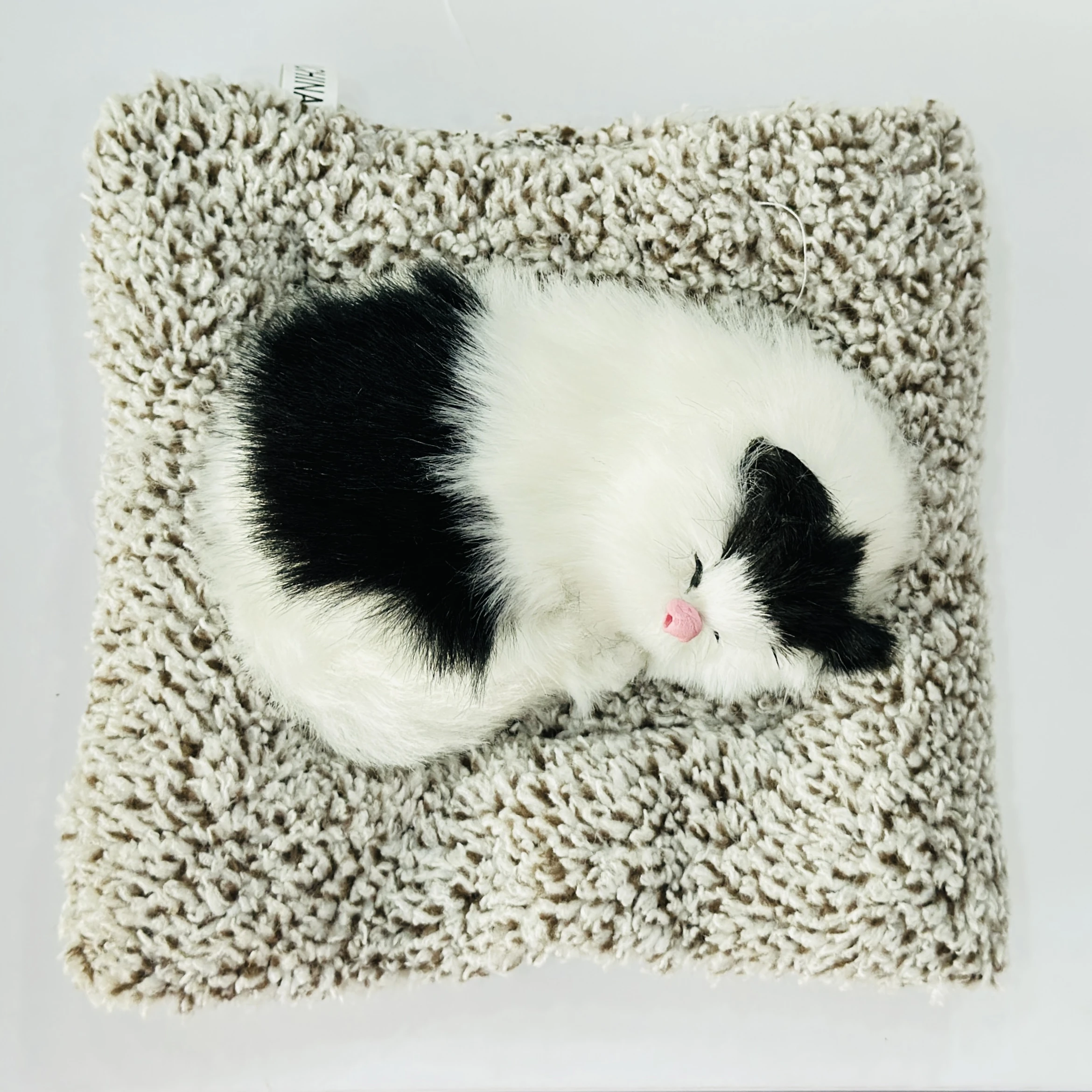 Sleeping cat plush toy