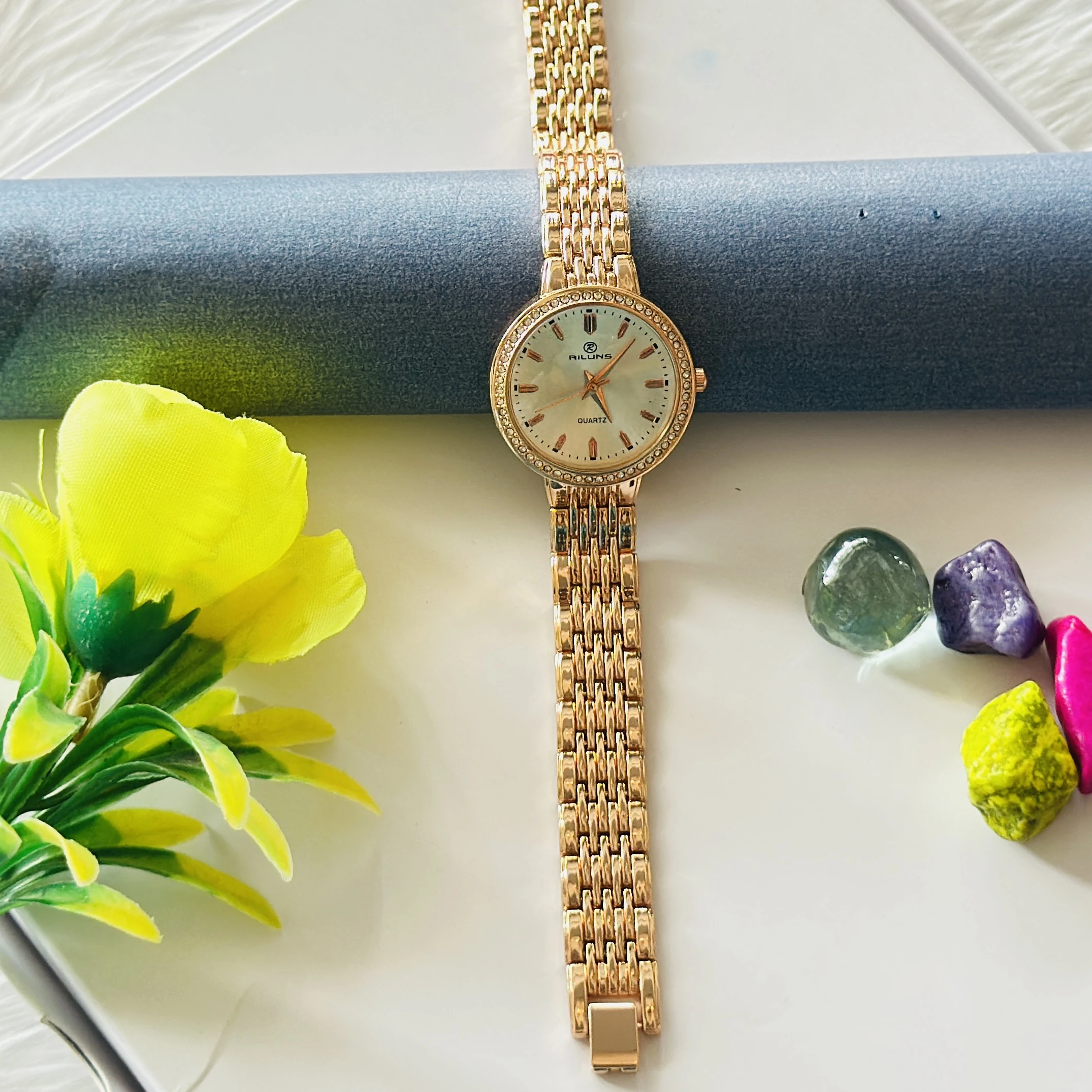 gold-toned Promise brand quartz women's watch