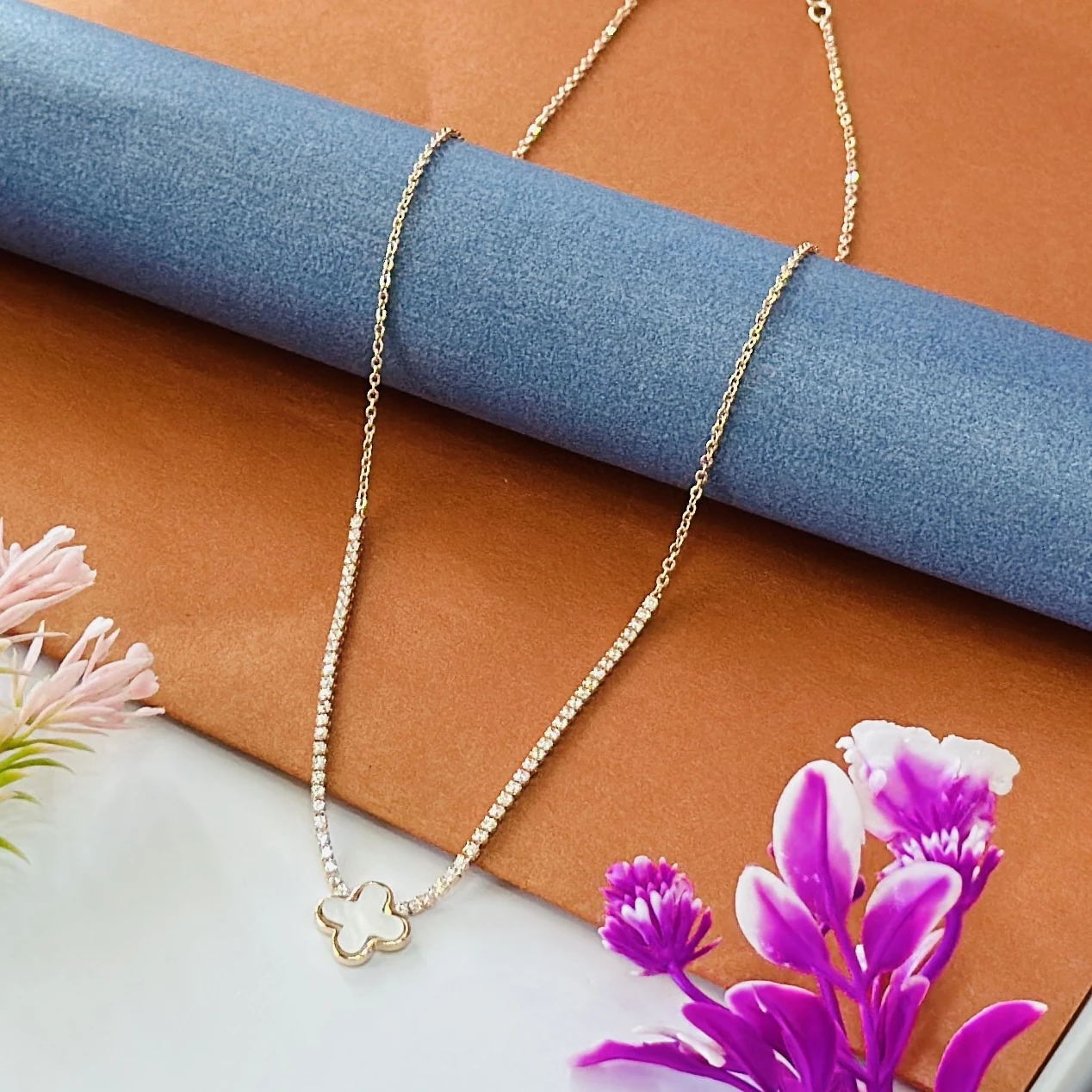 Gold plated four-leaf clover pendant