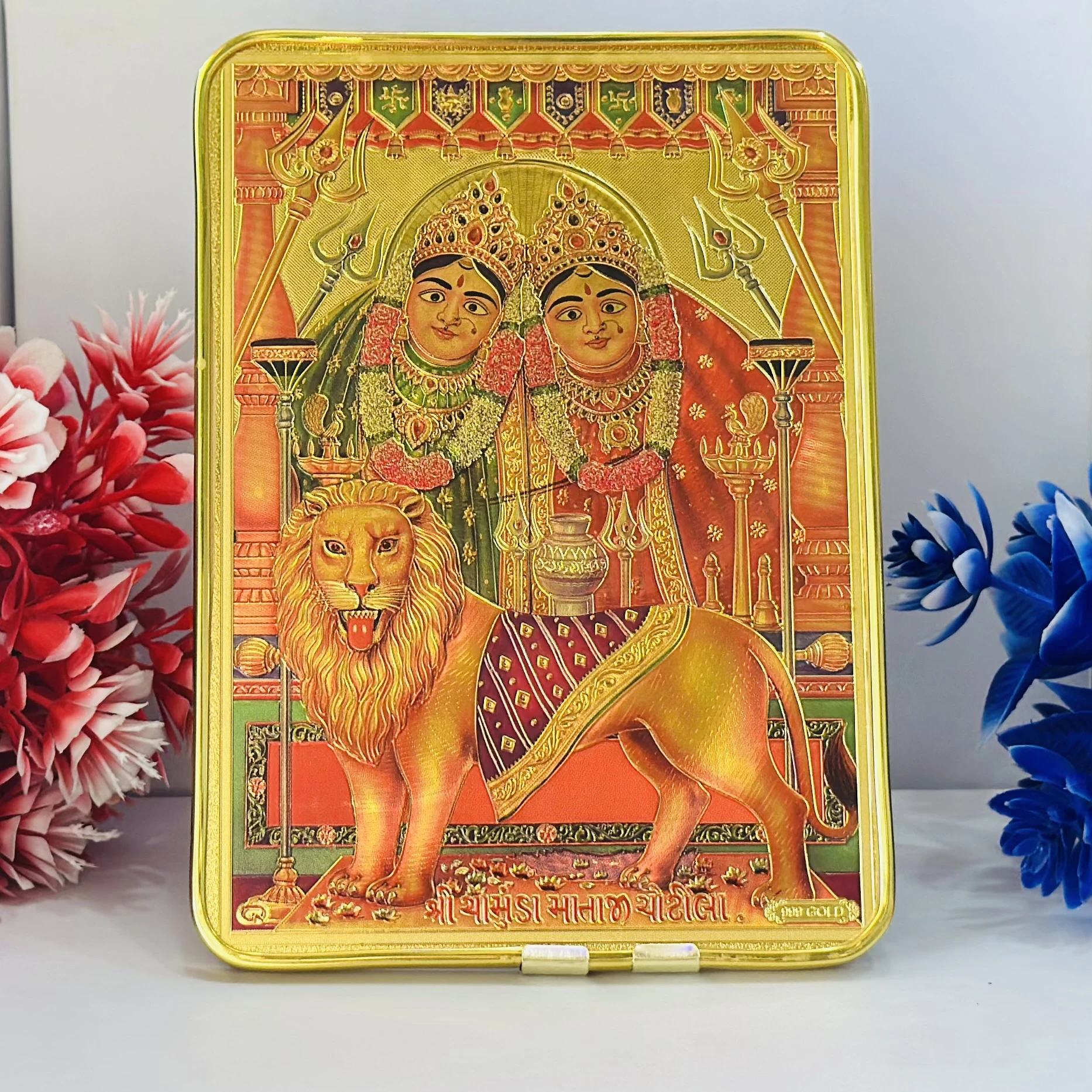Golden foil photo frame of Shri Chamunda Mataji.