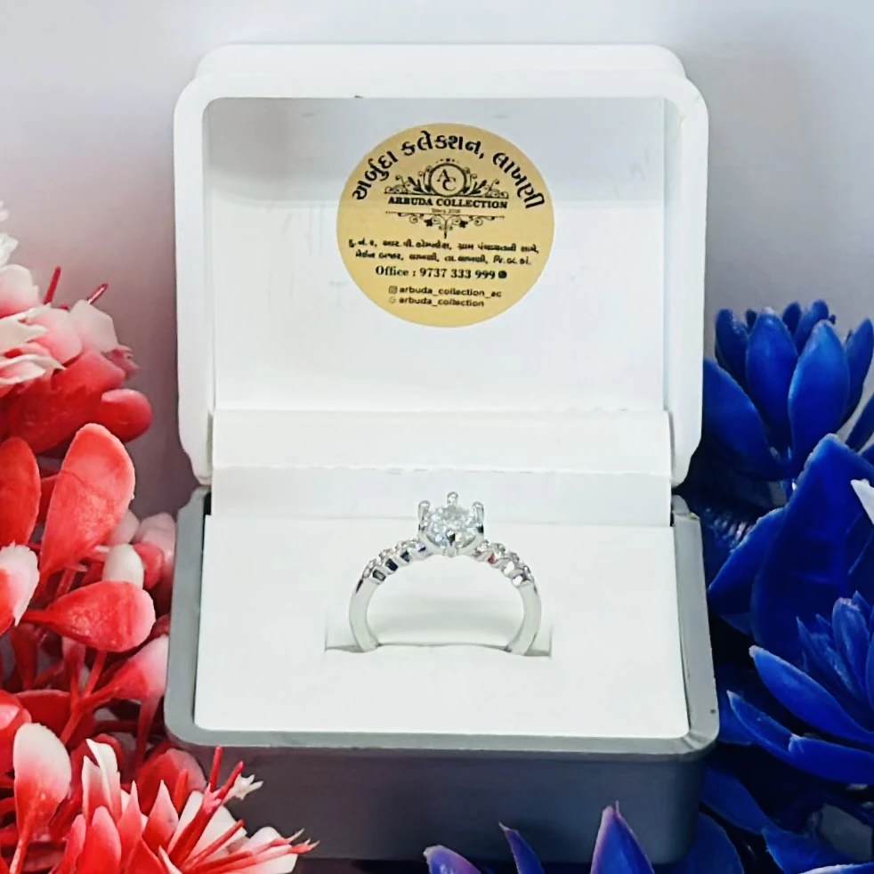 Silver ring with cubic zirconia stones.
