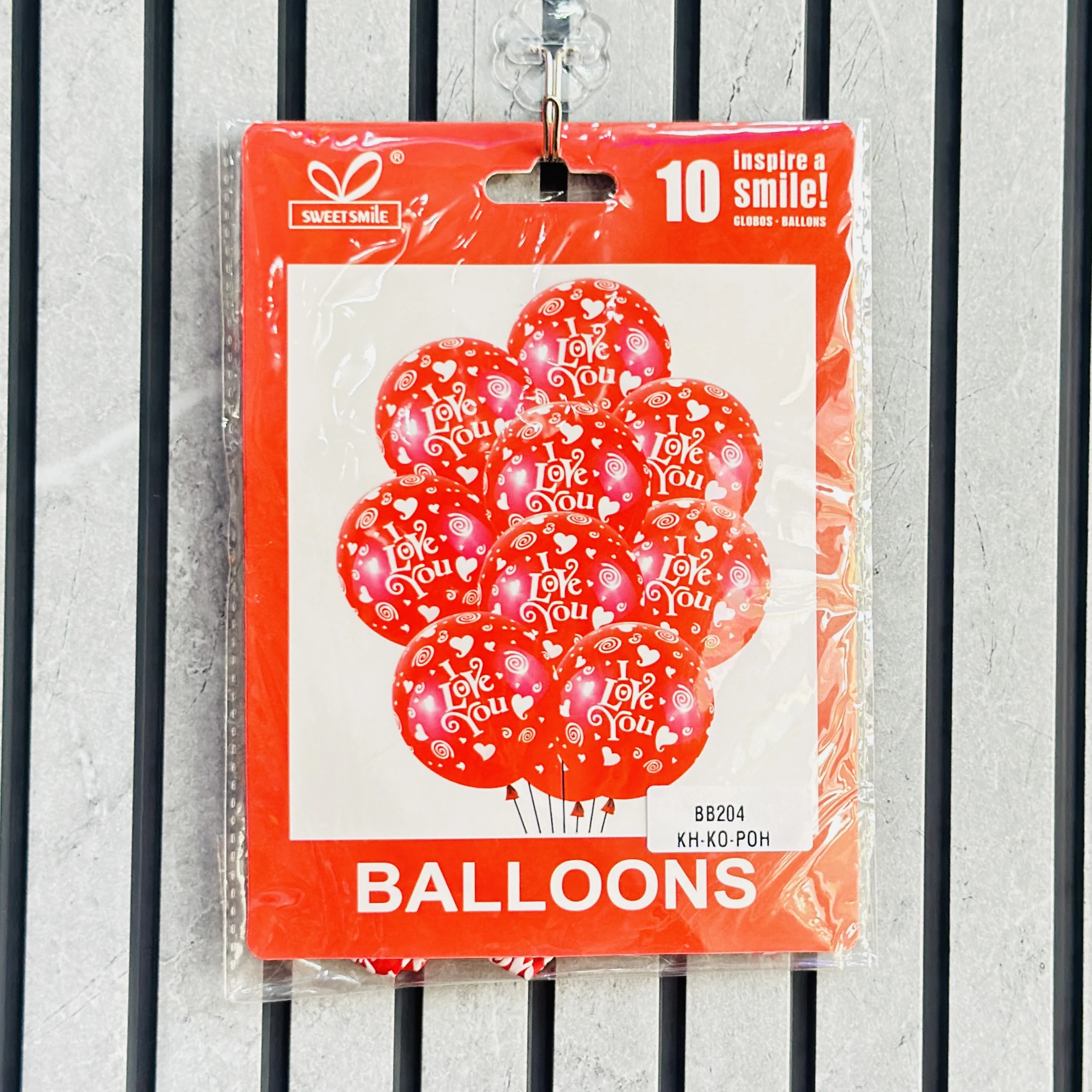 Sweet Smile red latex balloons featuring "I Love You" text and heart prints for Valentine's Day