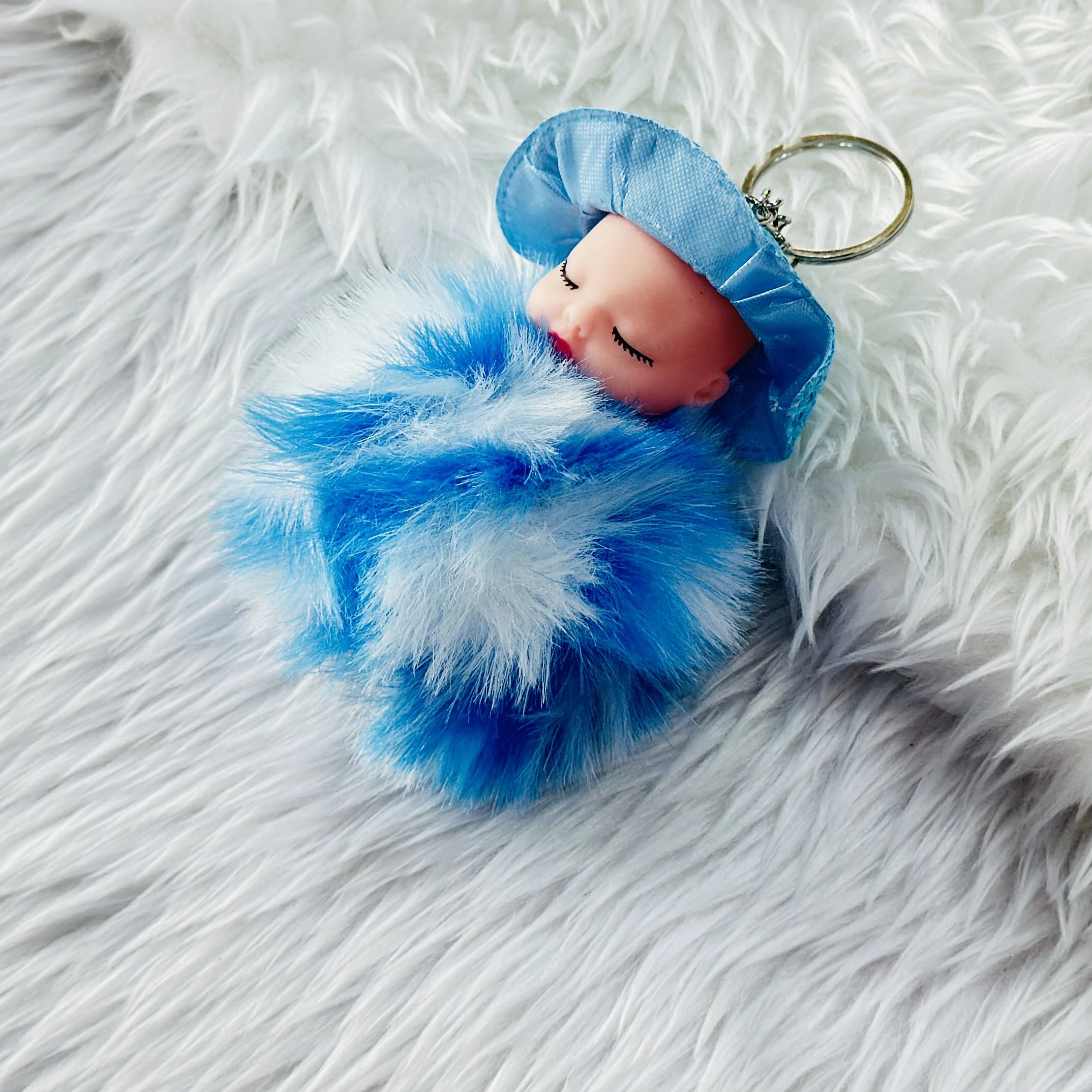 fluffy sleeping baby doll keychain