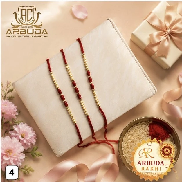 red thread rakhis adorned with alternating red and gold-colored beads.