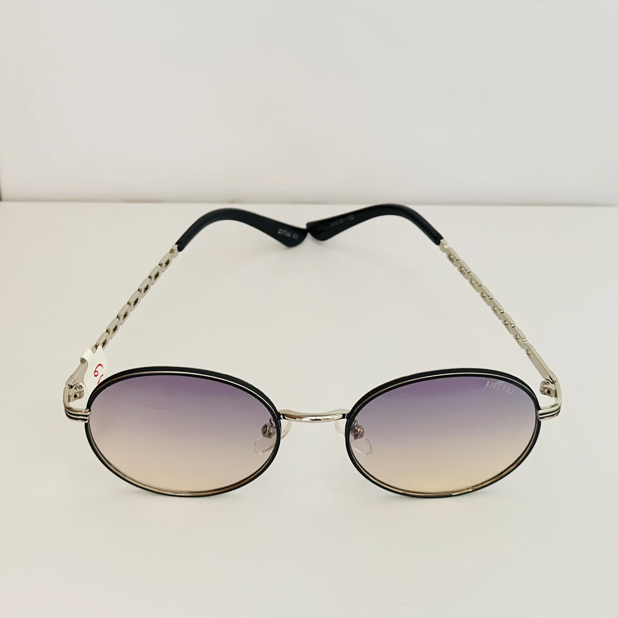 Moncler Tatou ML 0224 sunglasses in  metal with round lenses.