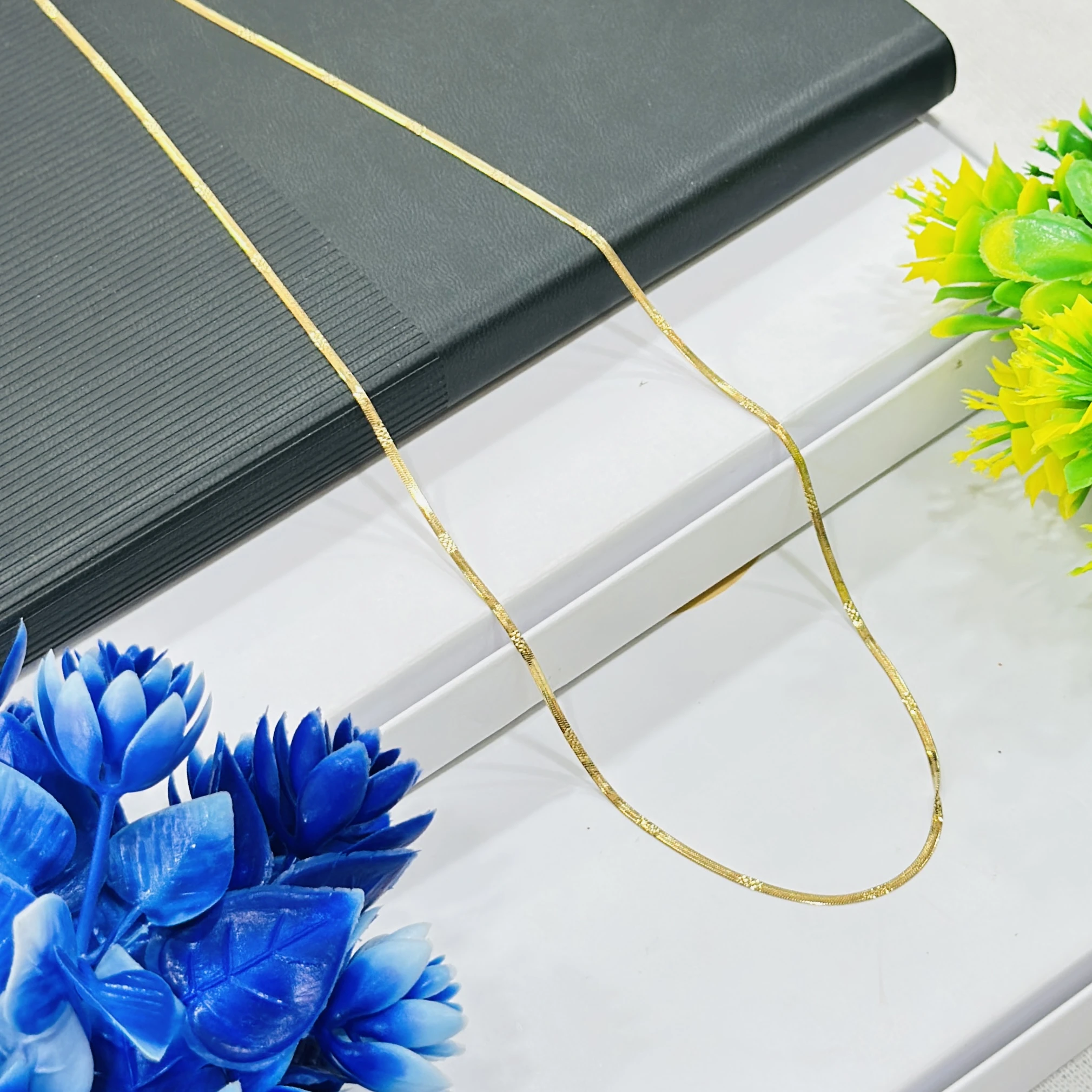 premium gold-plated herringbone snake chain.