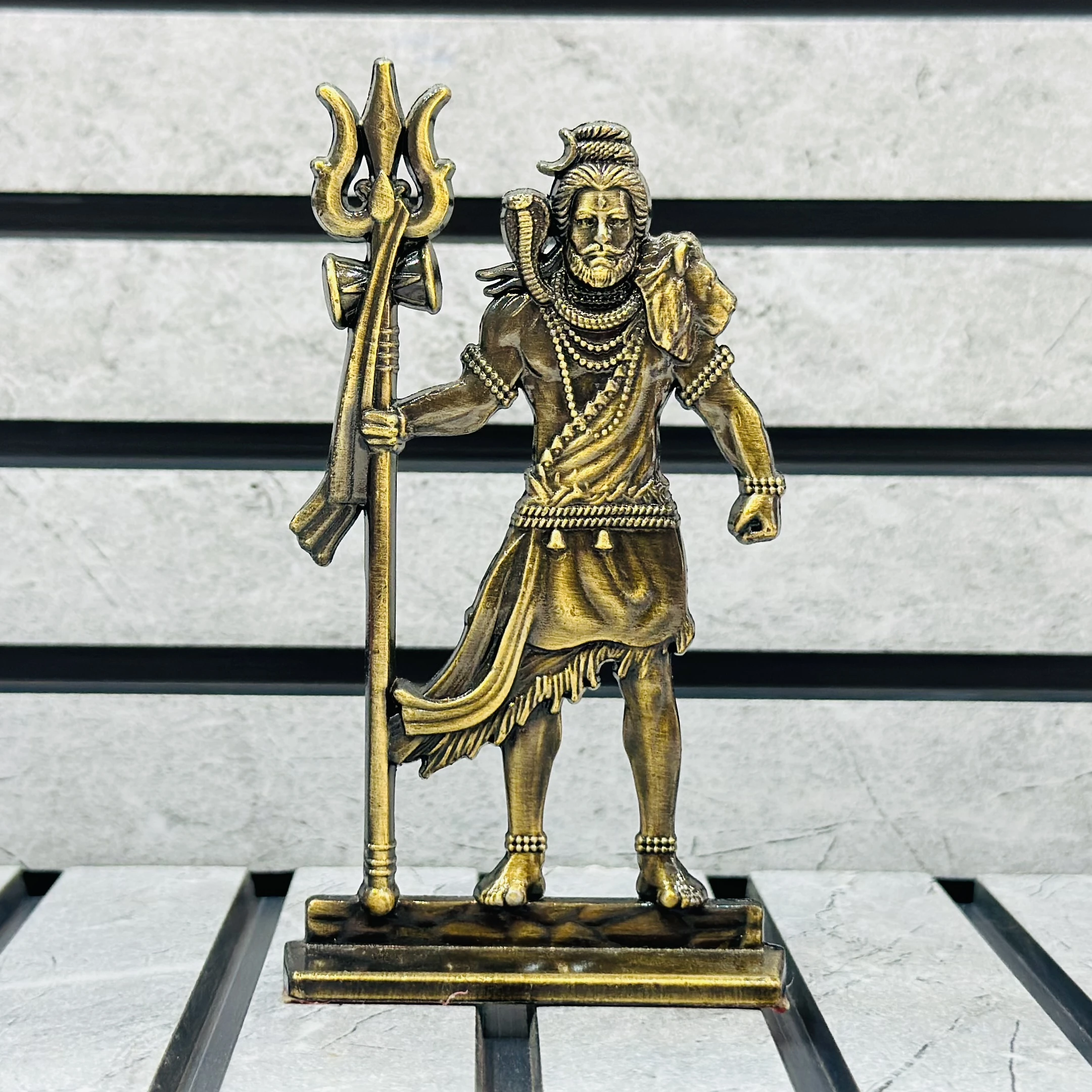 brass statue of the Hindu deity Lord Shiva.