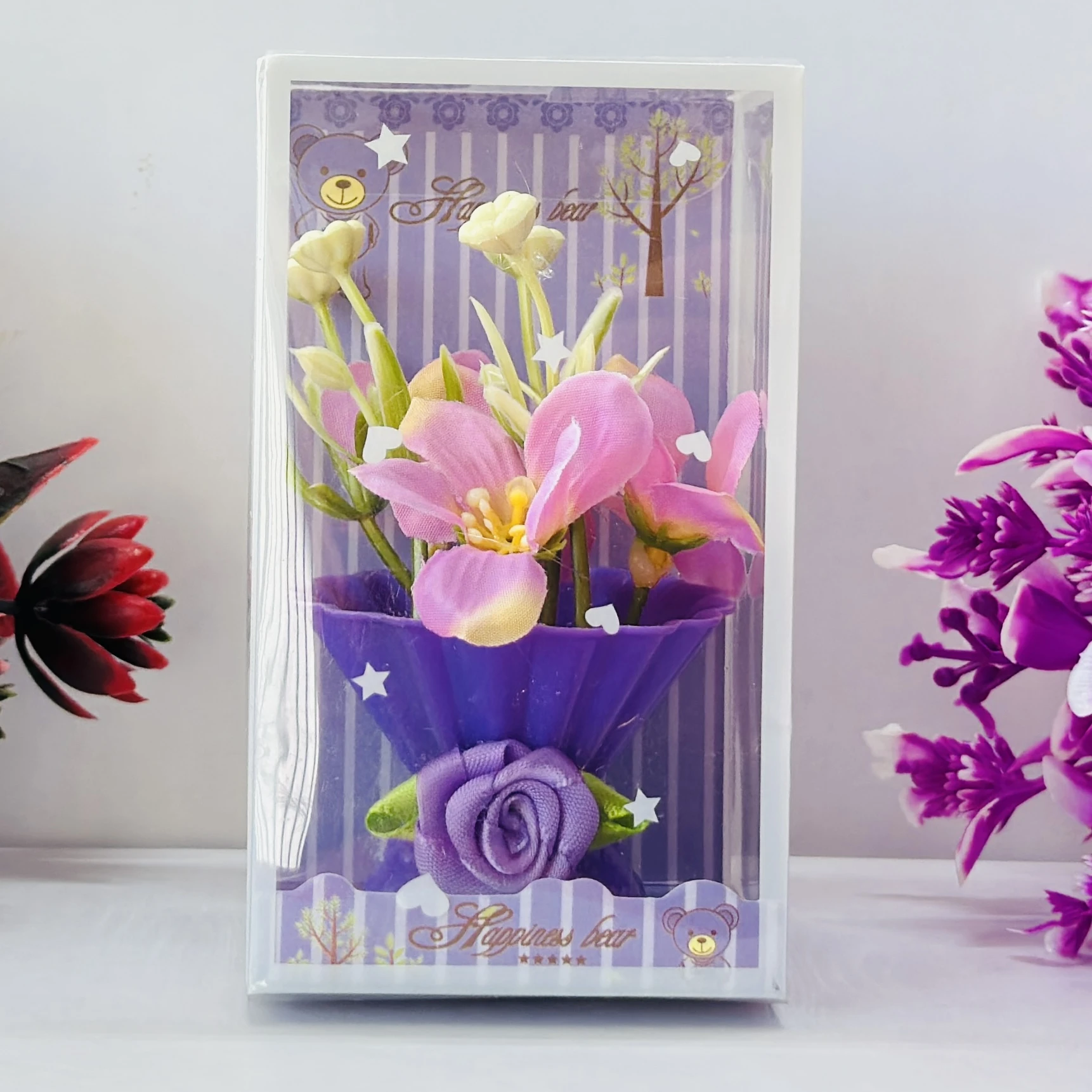 Tulip flower arrangement in a decorative gift box.