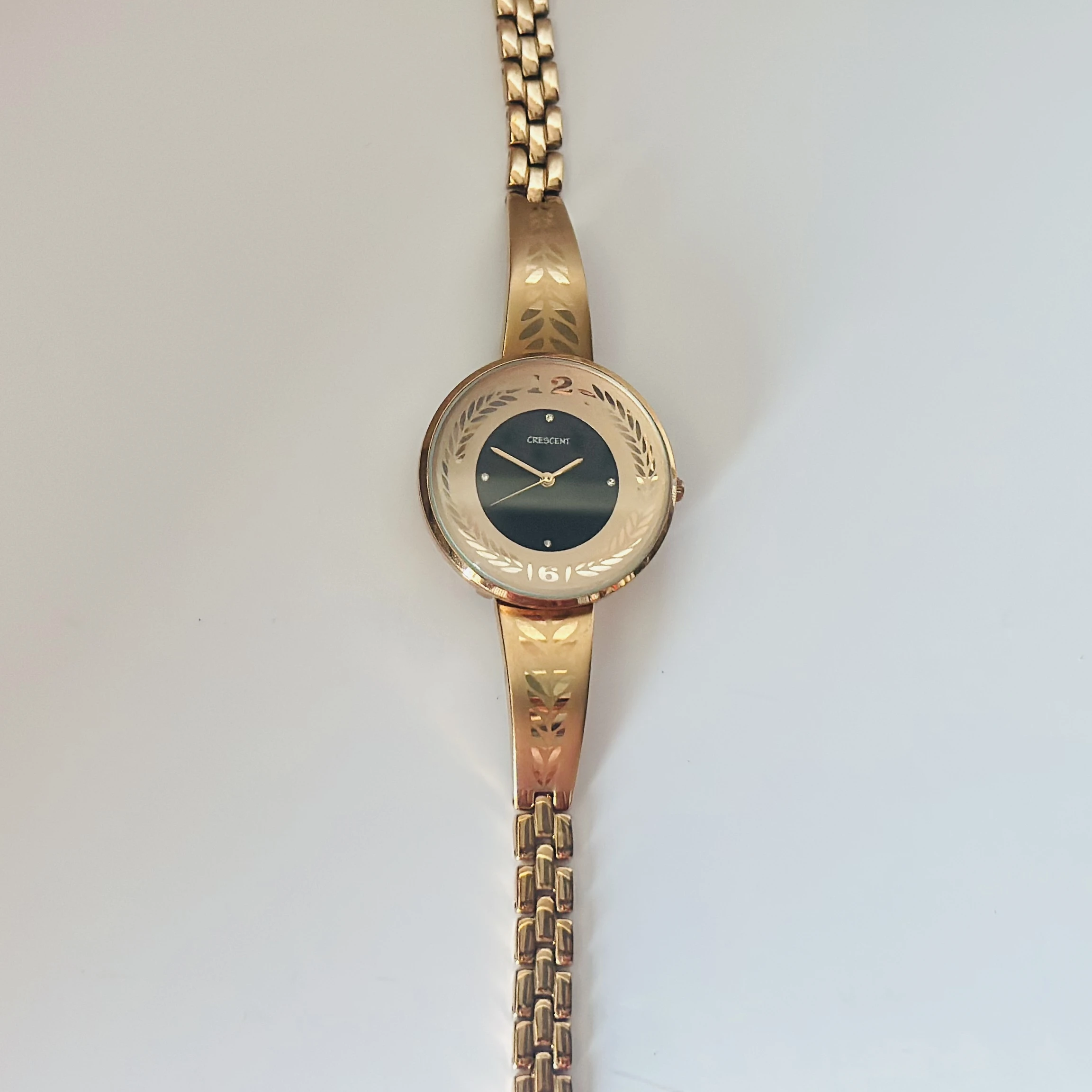 Montres Carlo women's gold-toned analog watch