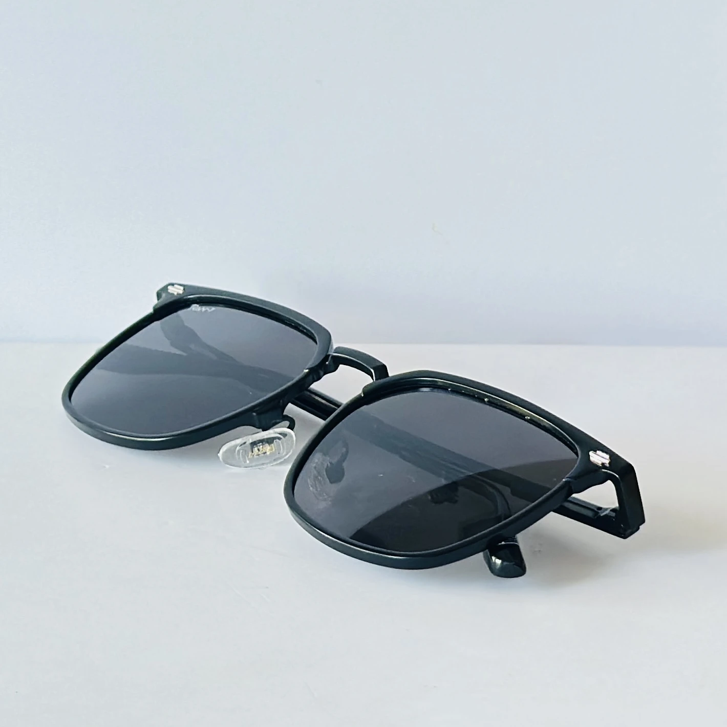 RAw-7 sunglasses feature a sleek black full-rim rectangle frame