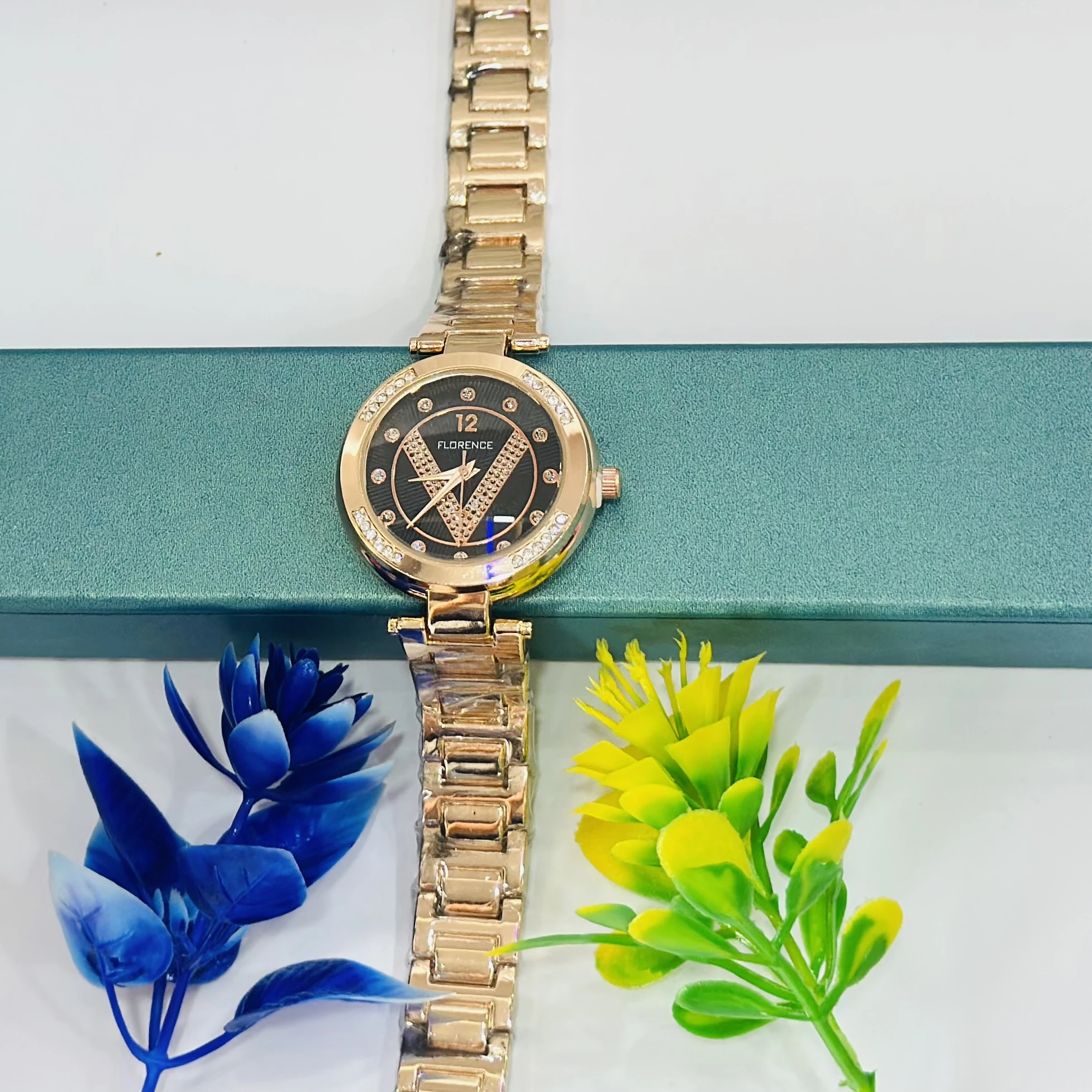 Analogue Women's Wrist Watch in rose gold color.