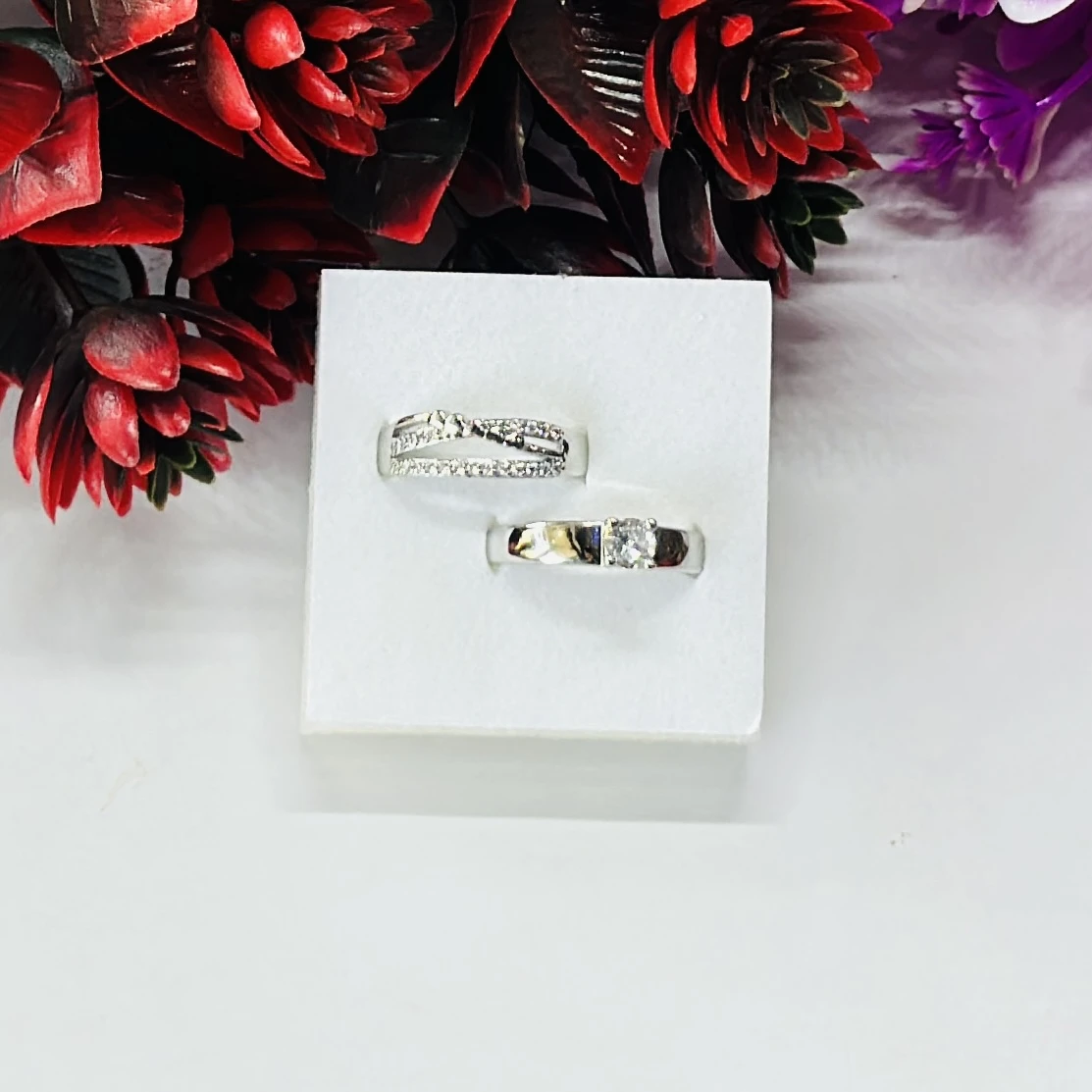 Set of silver-toned couple rings