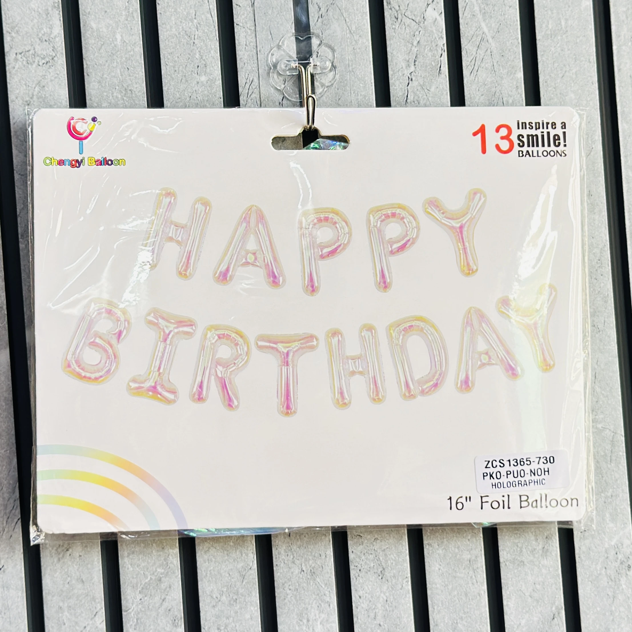 holographic 16-inch "Happy Birthday" letter foil balloon set by Chengyi Balloon.