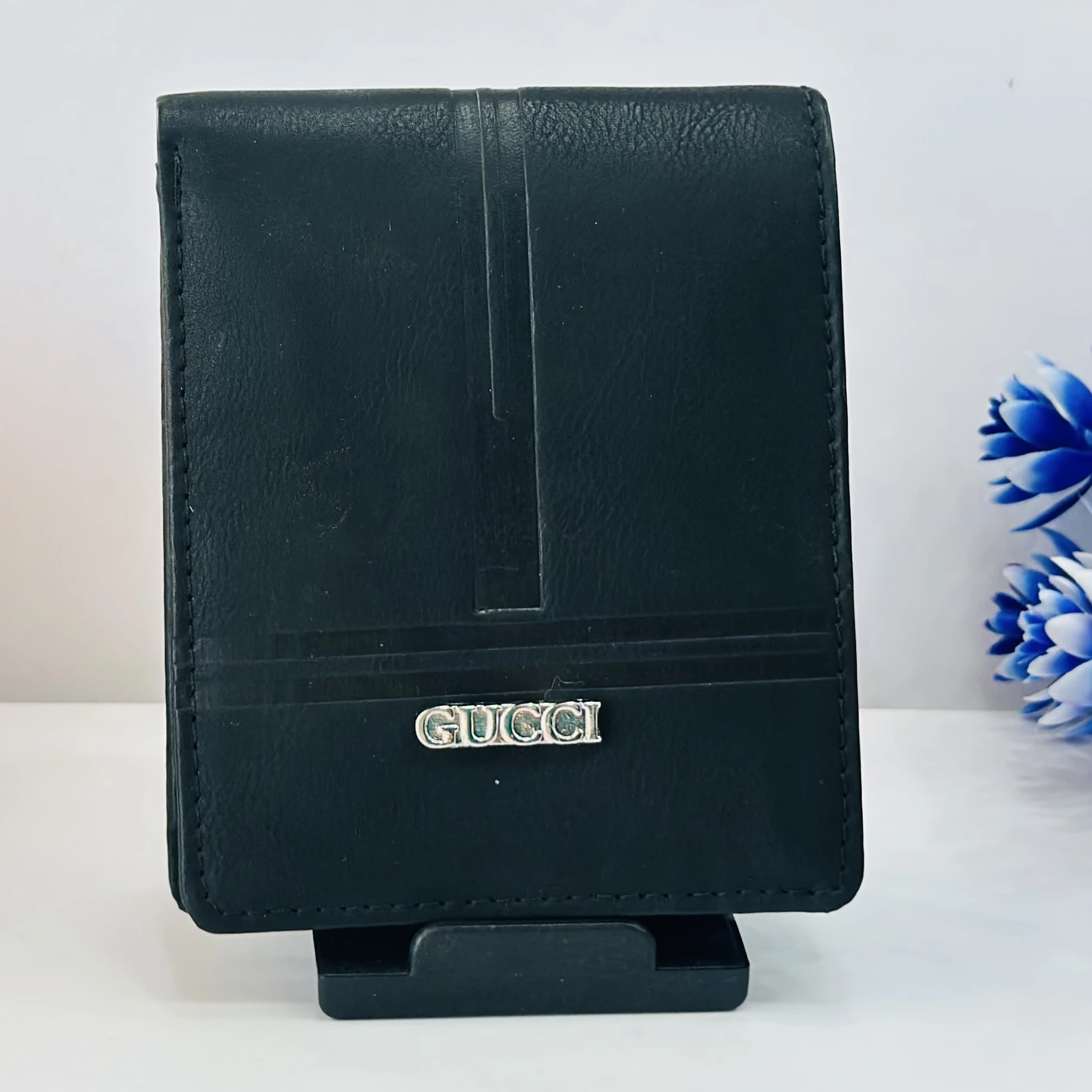 Black leather bi-fold men's wallet