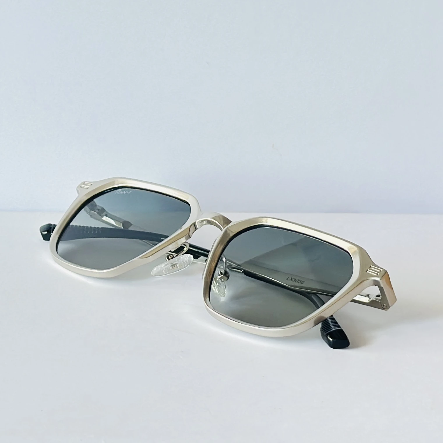 RAV-7 sunglasses feature a sleek black full-rim rectangle frame