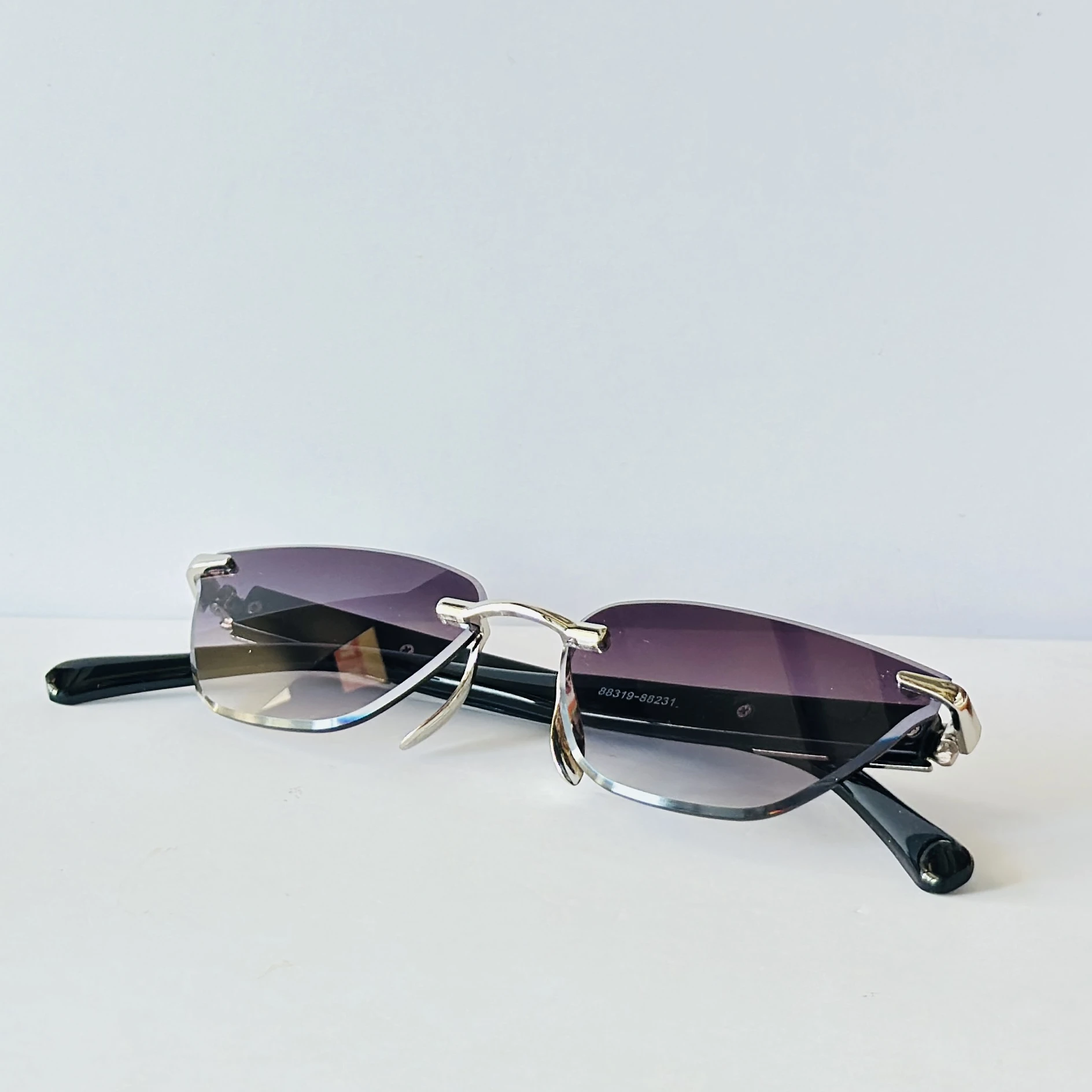 Rimless cat-eye sunglasses