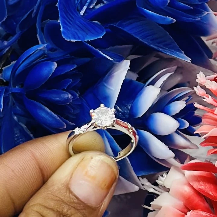 An adjustable silver-plated ring