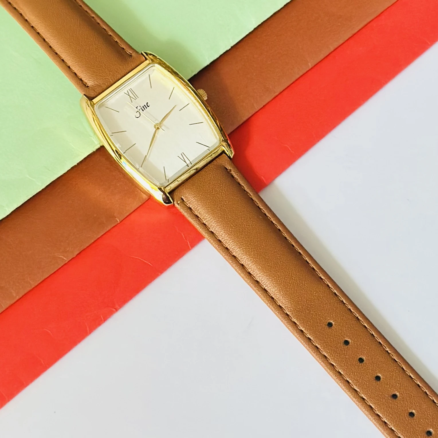 Edge Quartz Analog watch for men with a white dial and brown leather strap.