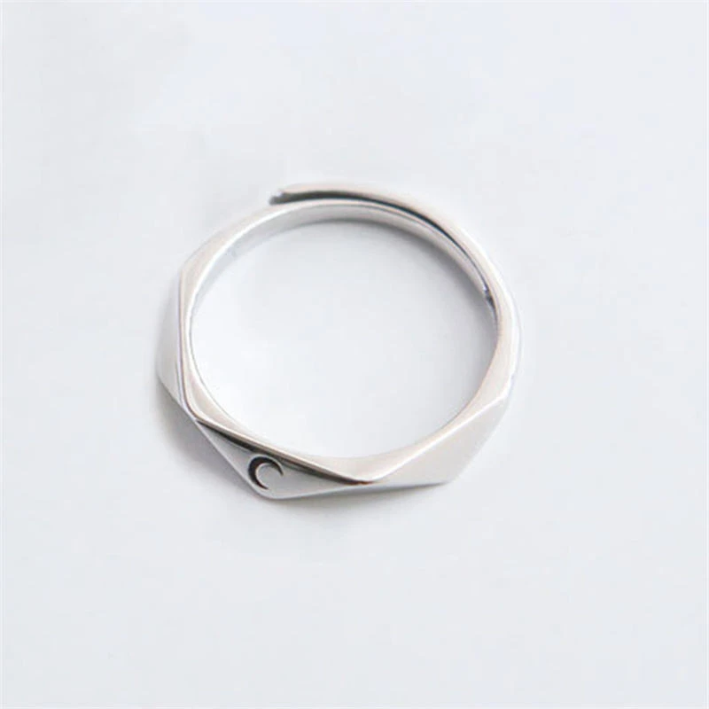 Set of silver-toned couple rings