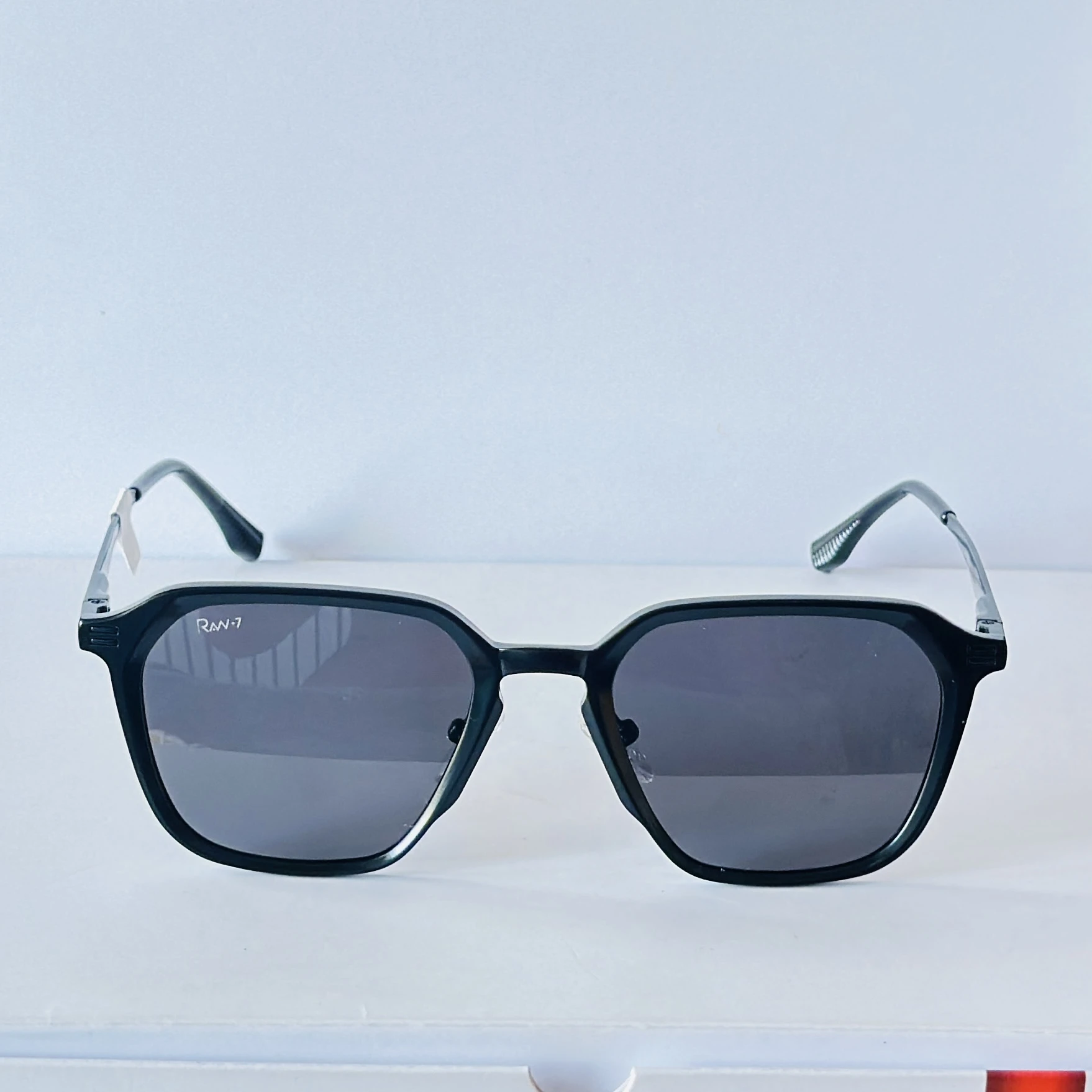 pair of black metal hexagonal sunglasses
