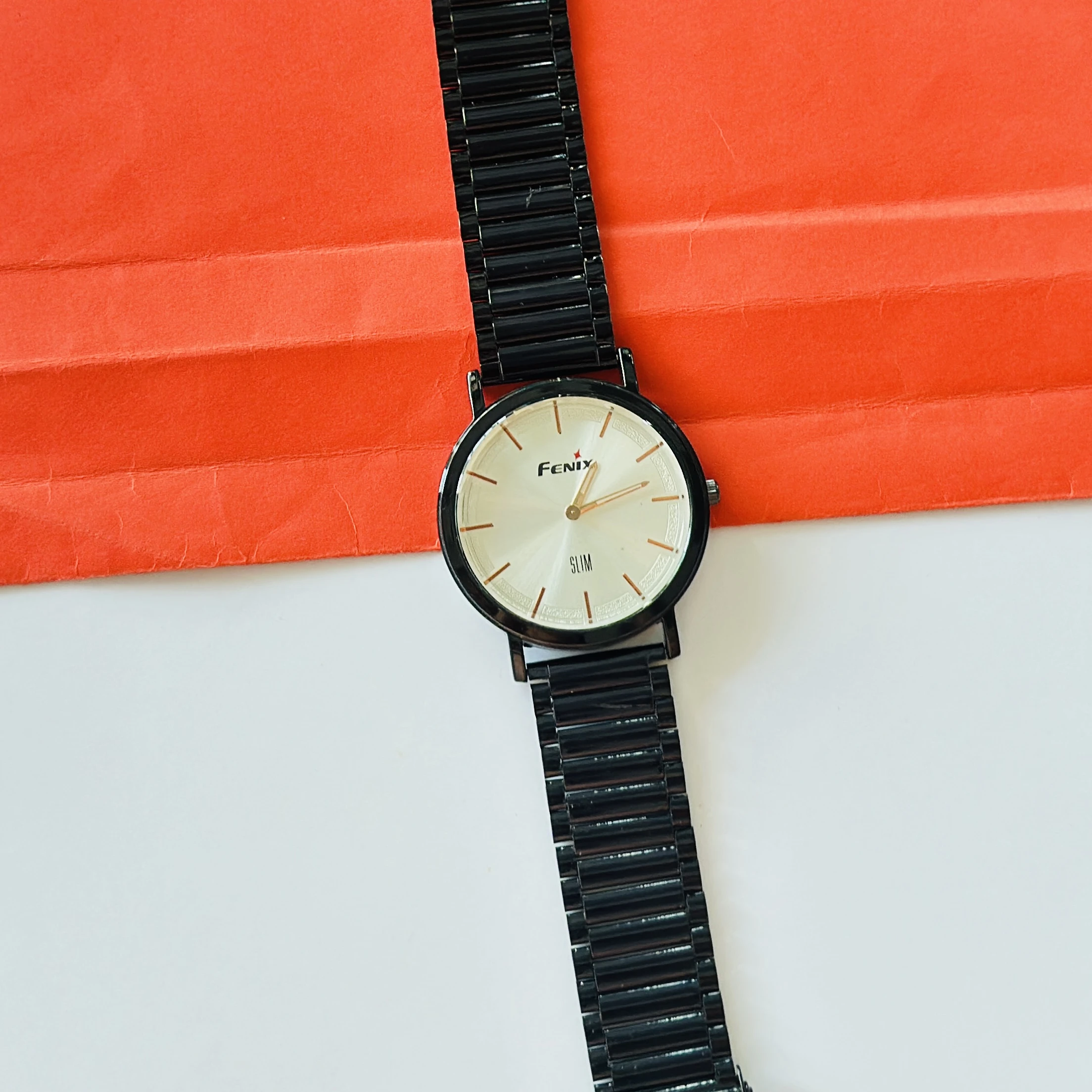 Black analog wristwatch
