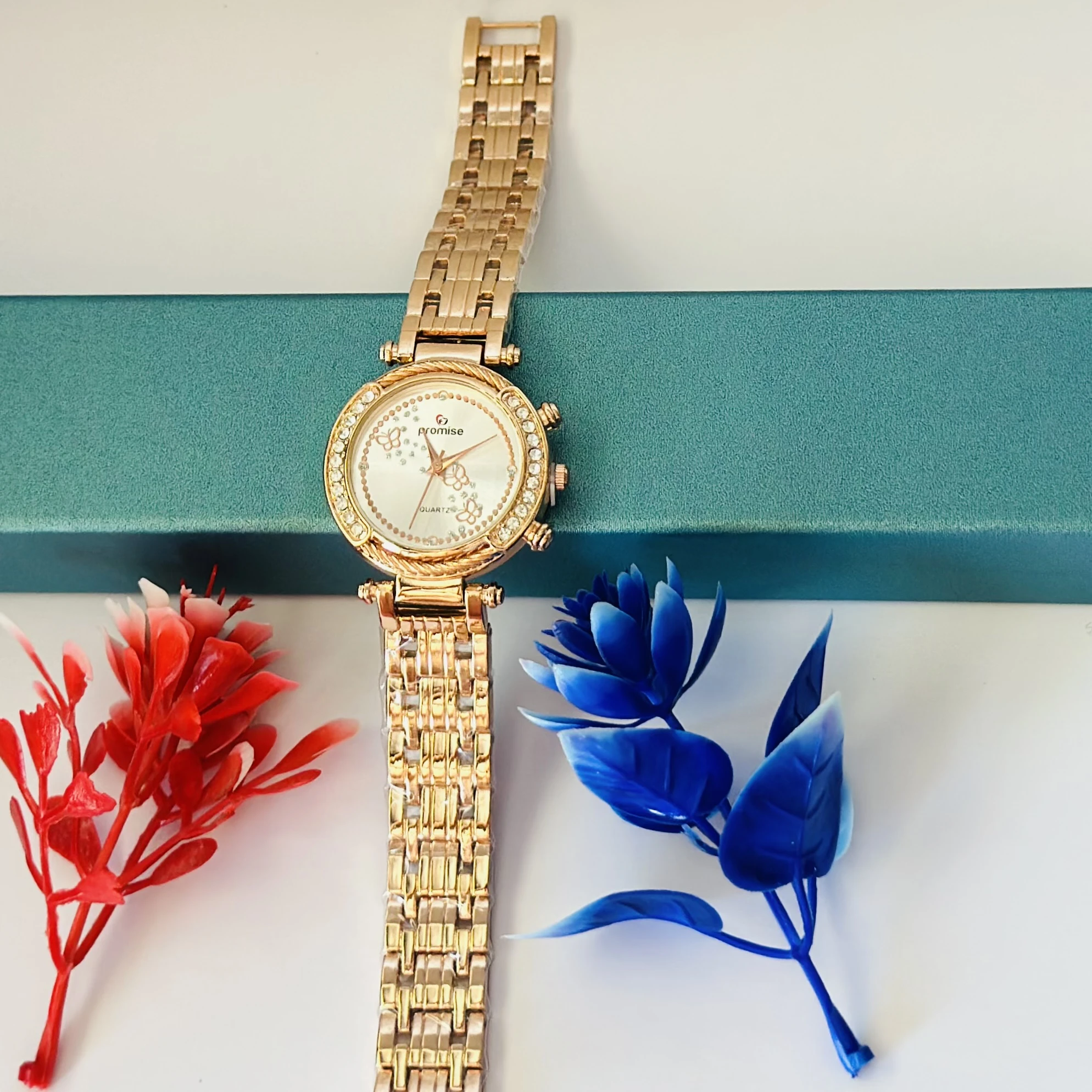 Promise Quartz watch with a rose gold-tone stainless steel bracelet
