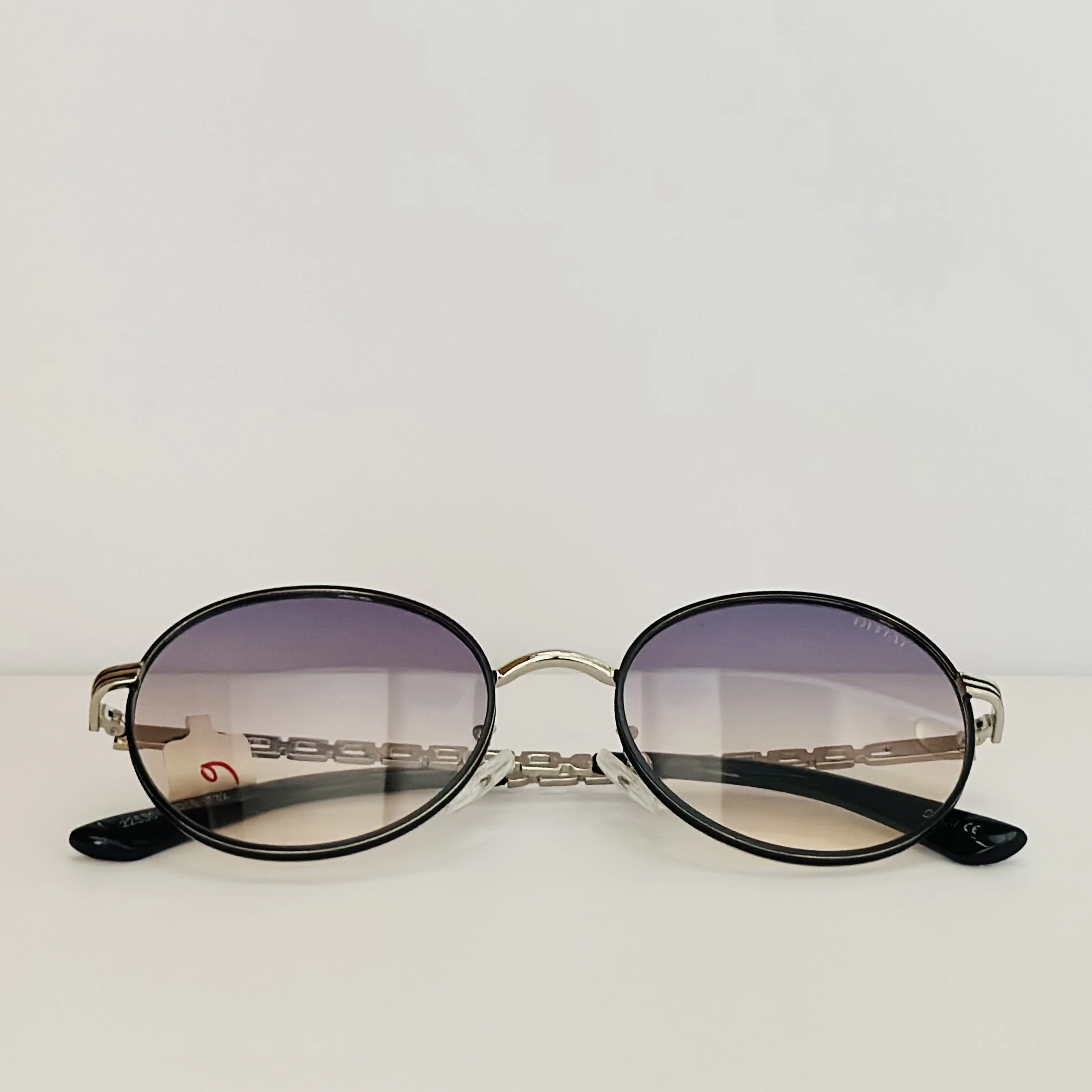 Moncler Tatou ML 0224 sunglasses in  metal with round lenses.