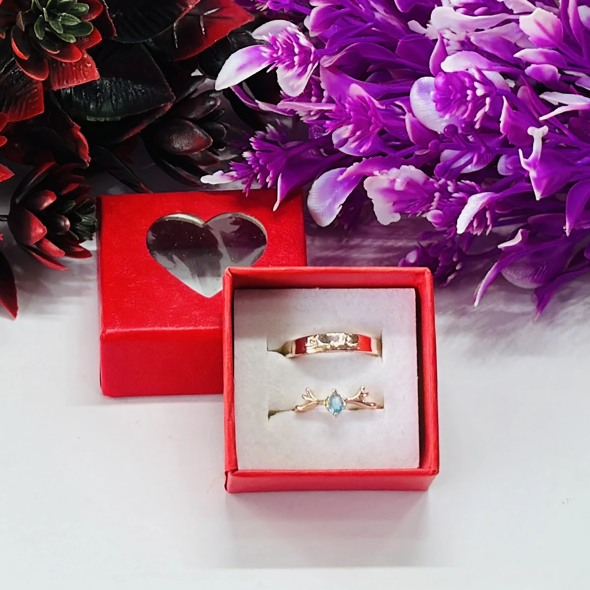 Rose gold nature-inspired wedding bands featuring a plain band and a twig branch ring