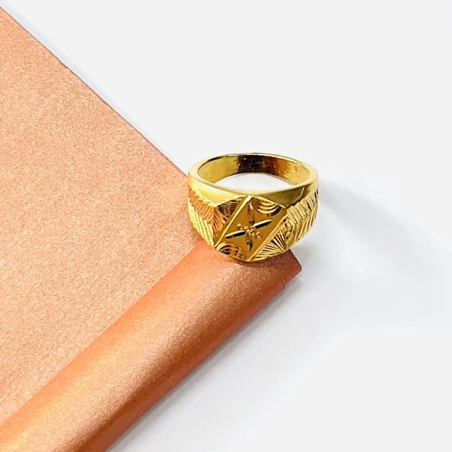 Men’s signet ring with a geometric design.
