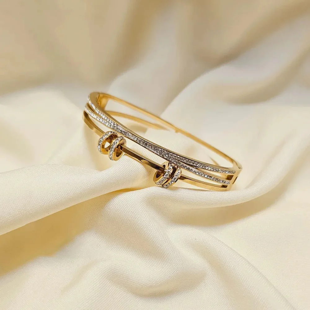 Gold toned multi-strand cuff bracelet