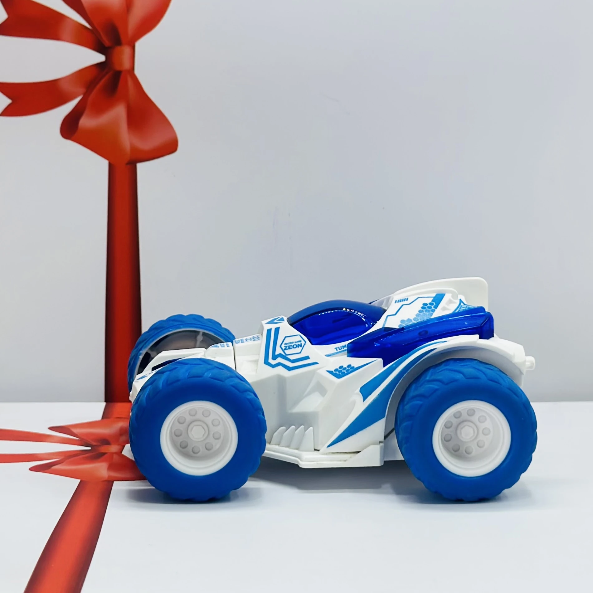 friction-powered toy stunt car