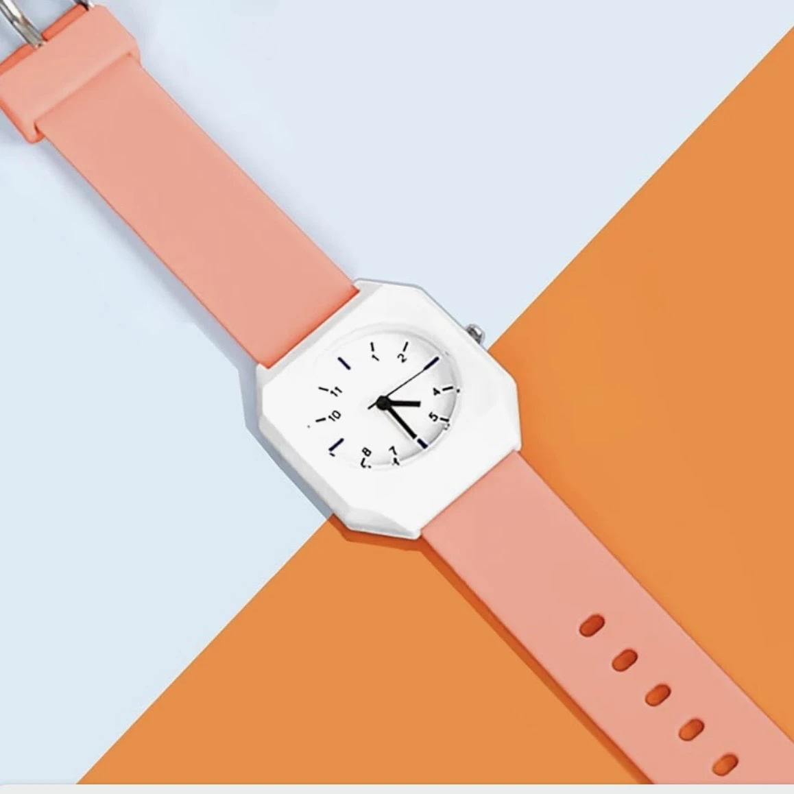 Mingrui analog quartz watch with a white plastic case and a peach/orange silicone strap