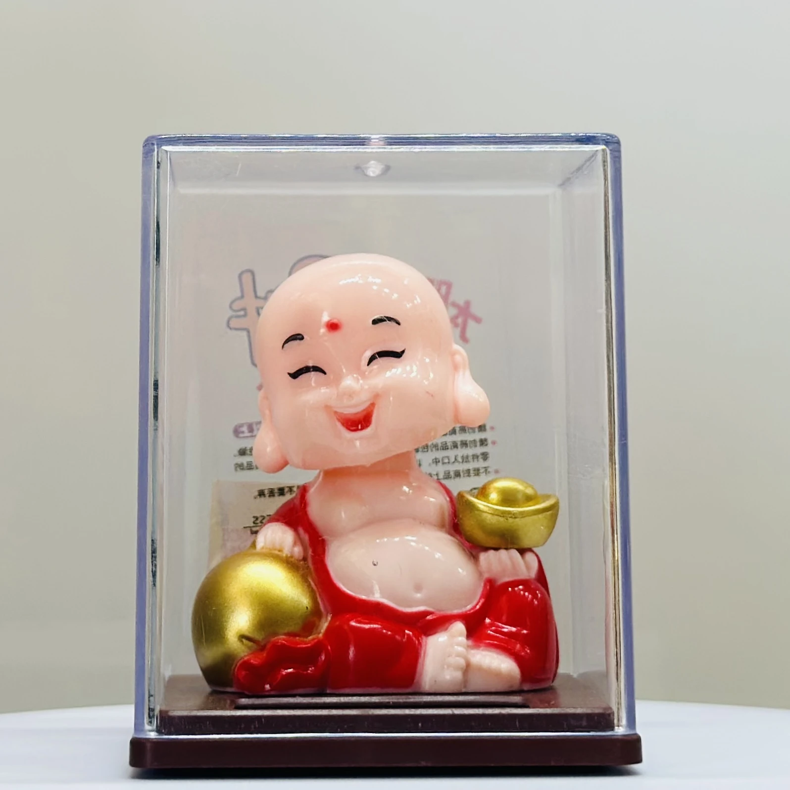 solar-powered smiley figurine