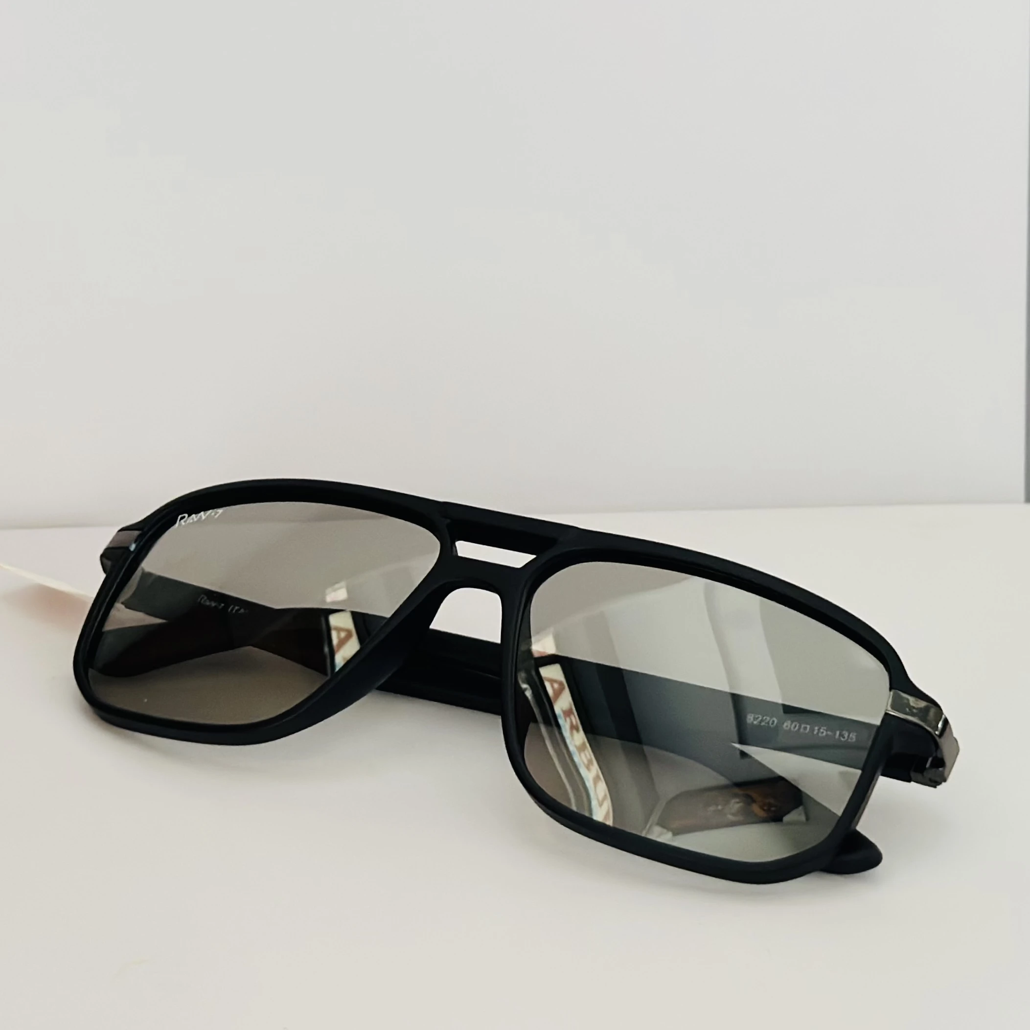 Black rectangular sunglasses