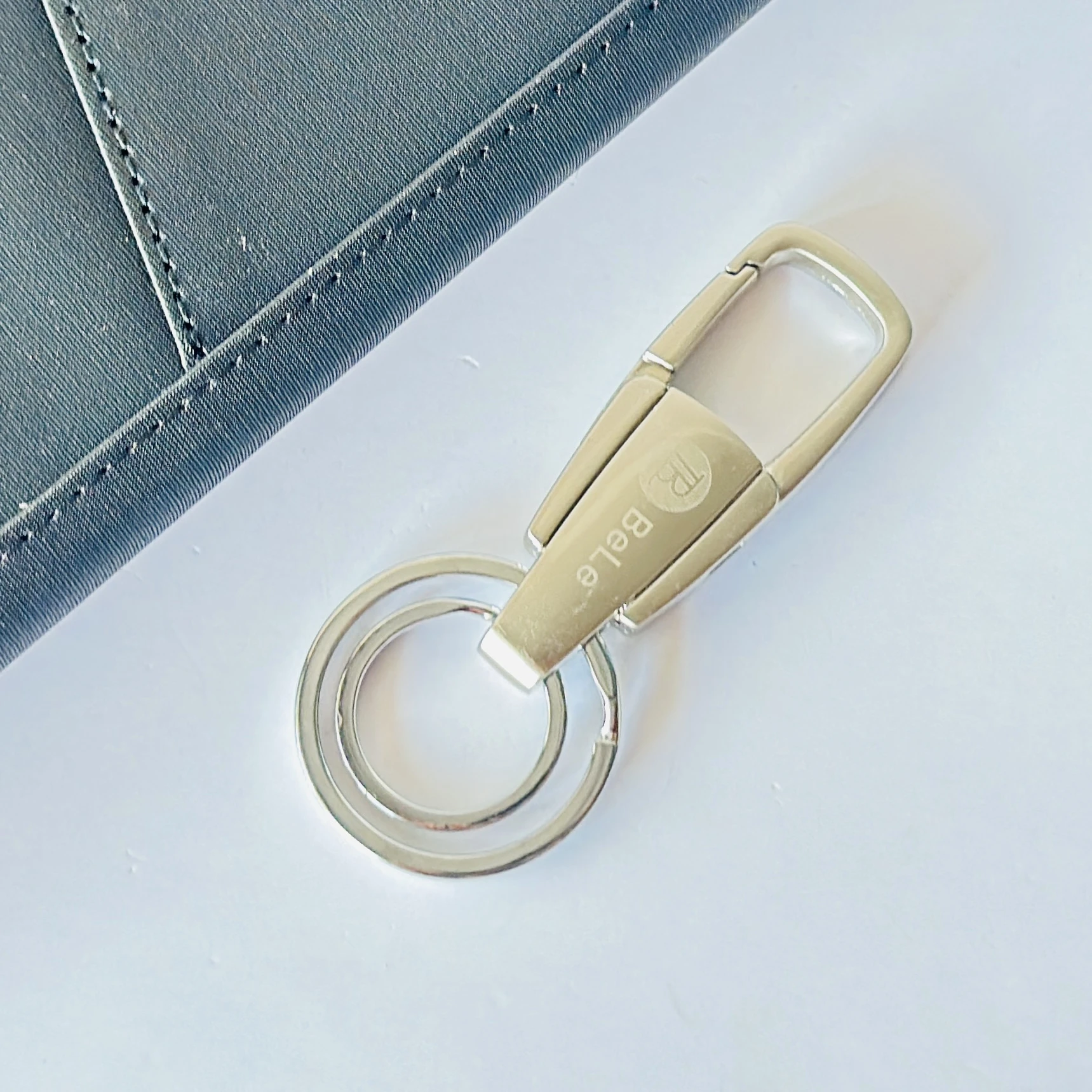 silver-toned metal keychain