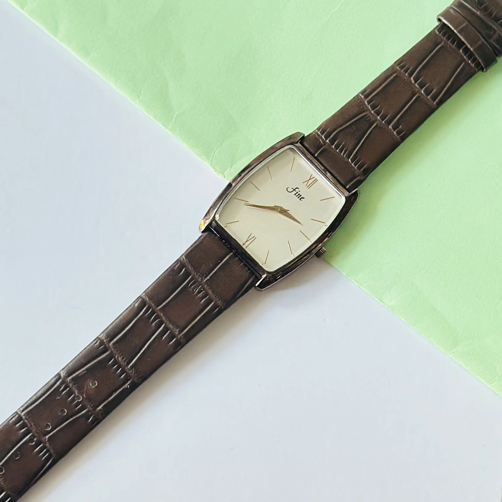 Edge analog watch for men with a white rectangular dial and a brown leather strap.