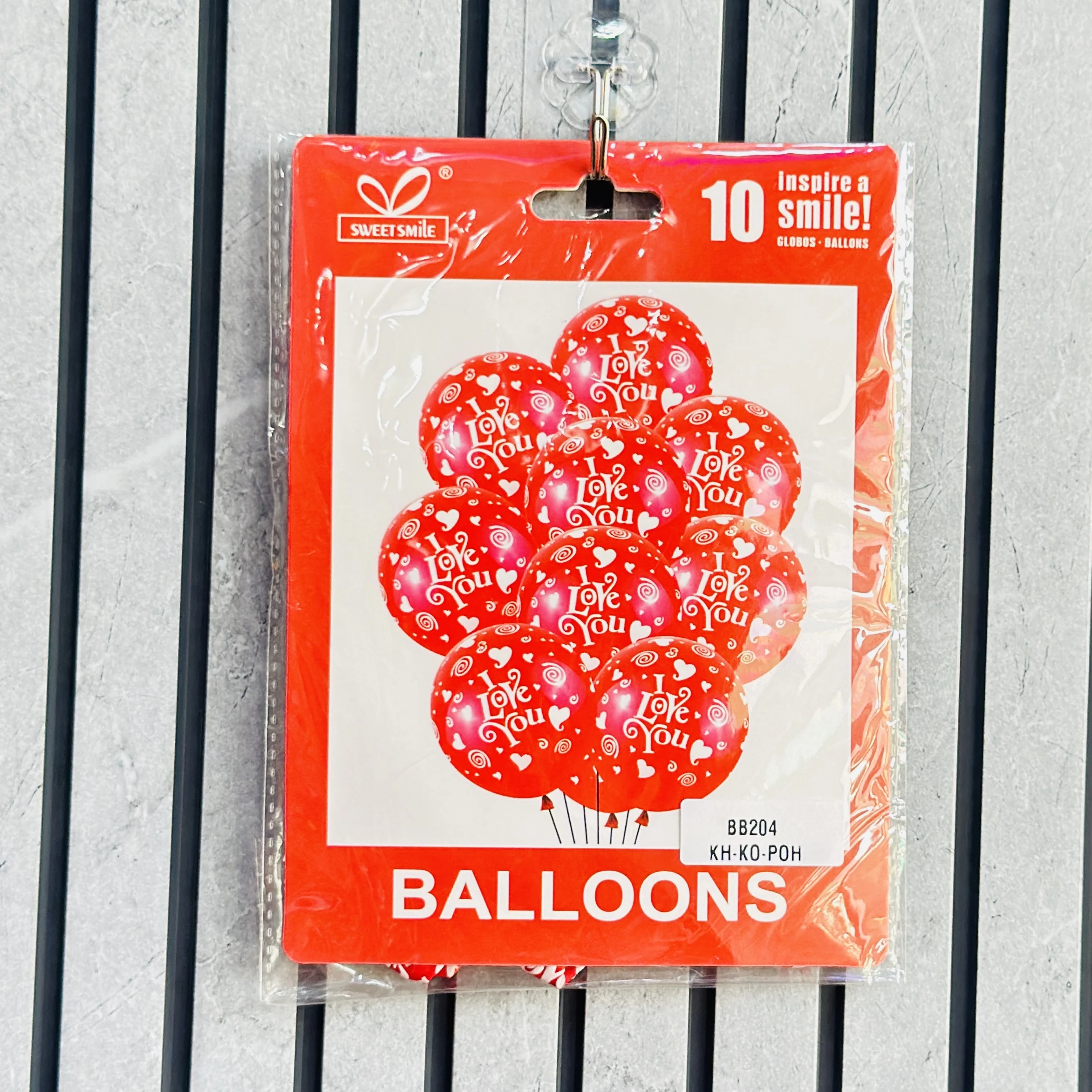 Sweet Smile red latex balloons featuring "I Love You" text and heart prints for Valentine's Day