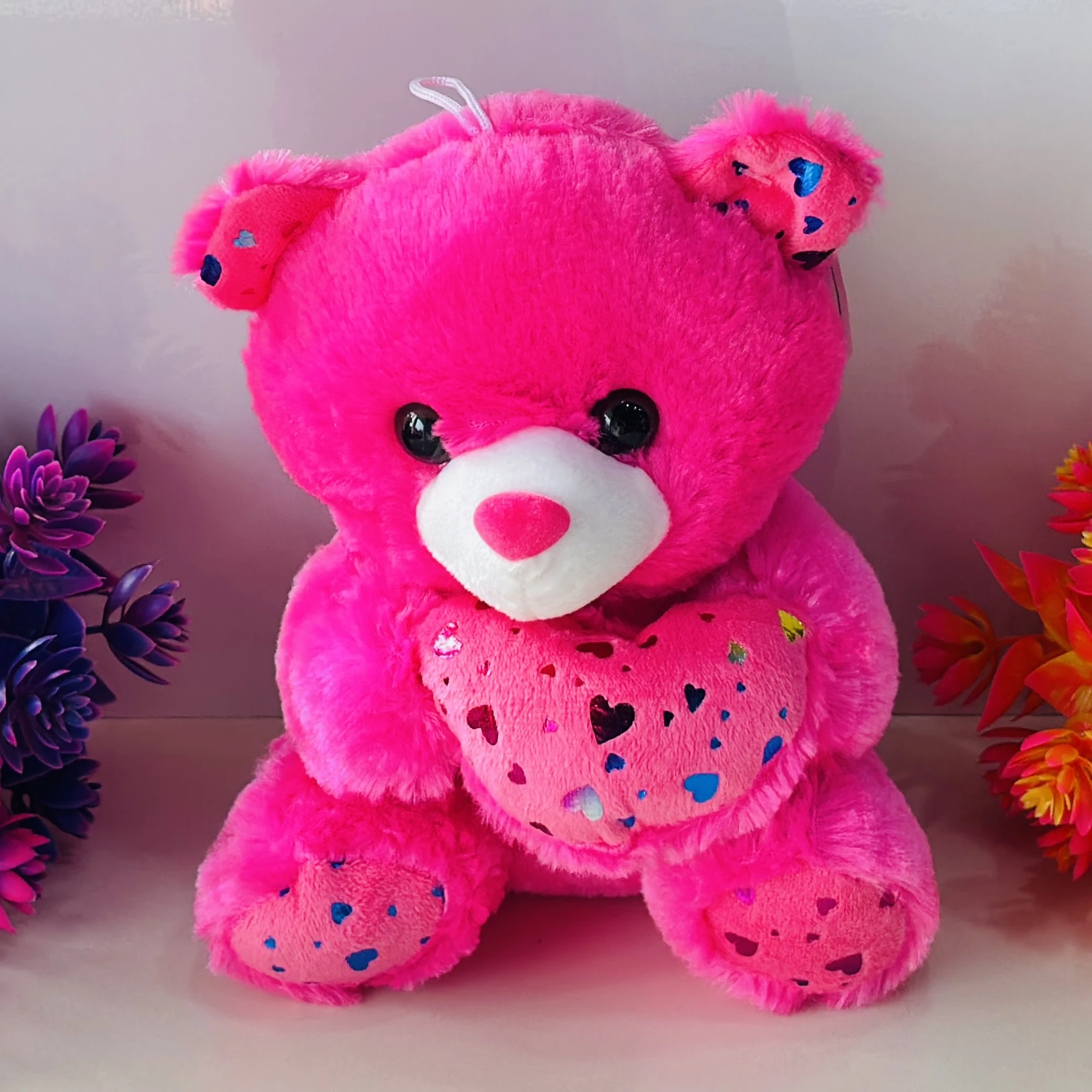 Bright pink plush teddy bear