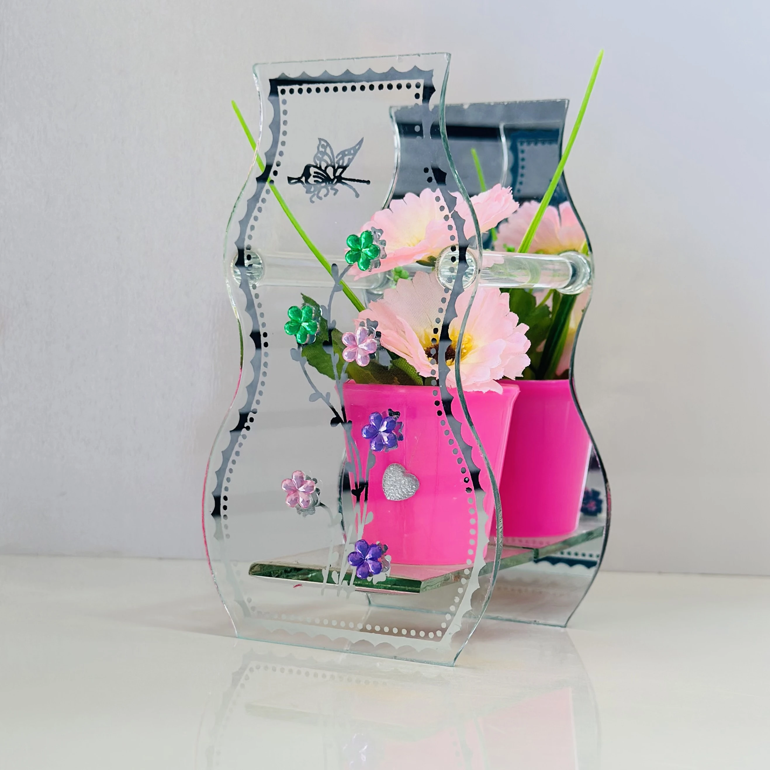 decorative glass vase with a purple pot and artificial flowers inside.(SKU-7QH3CH)