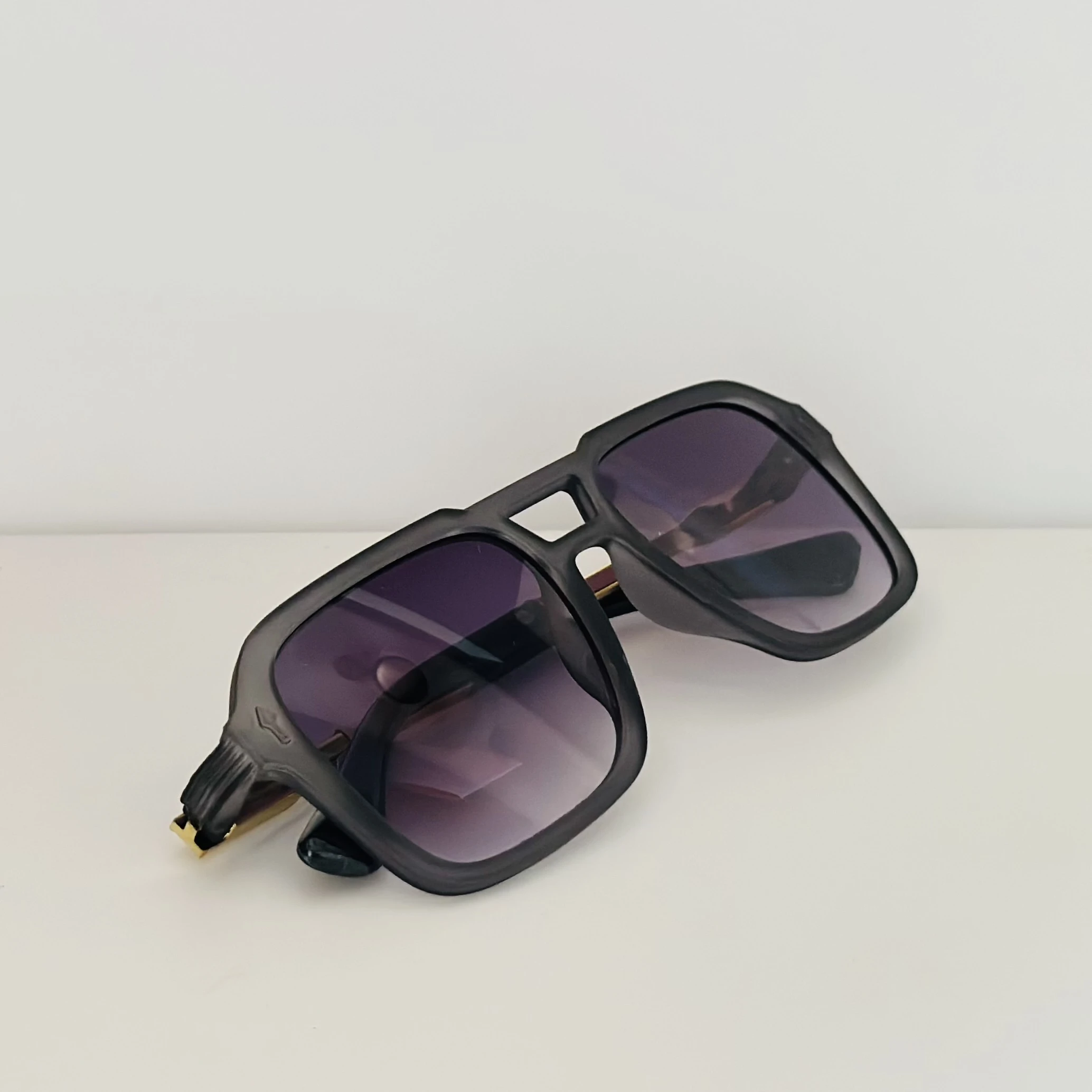 Cutler & Gross 1394 aviator sunglasses in a brown/cherry acetate frame.