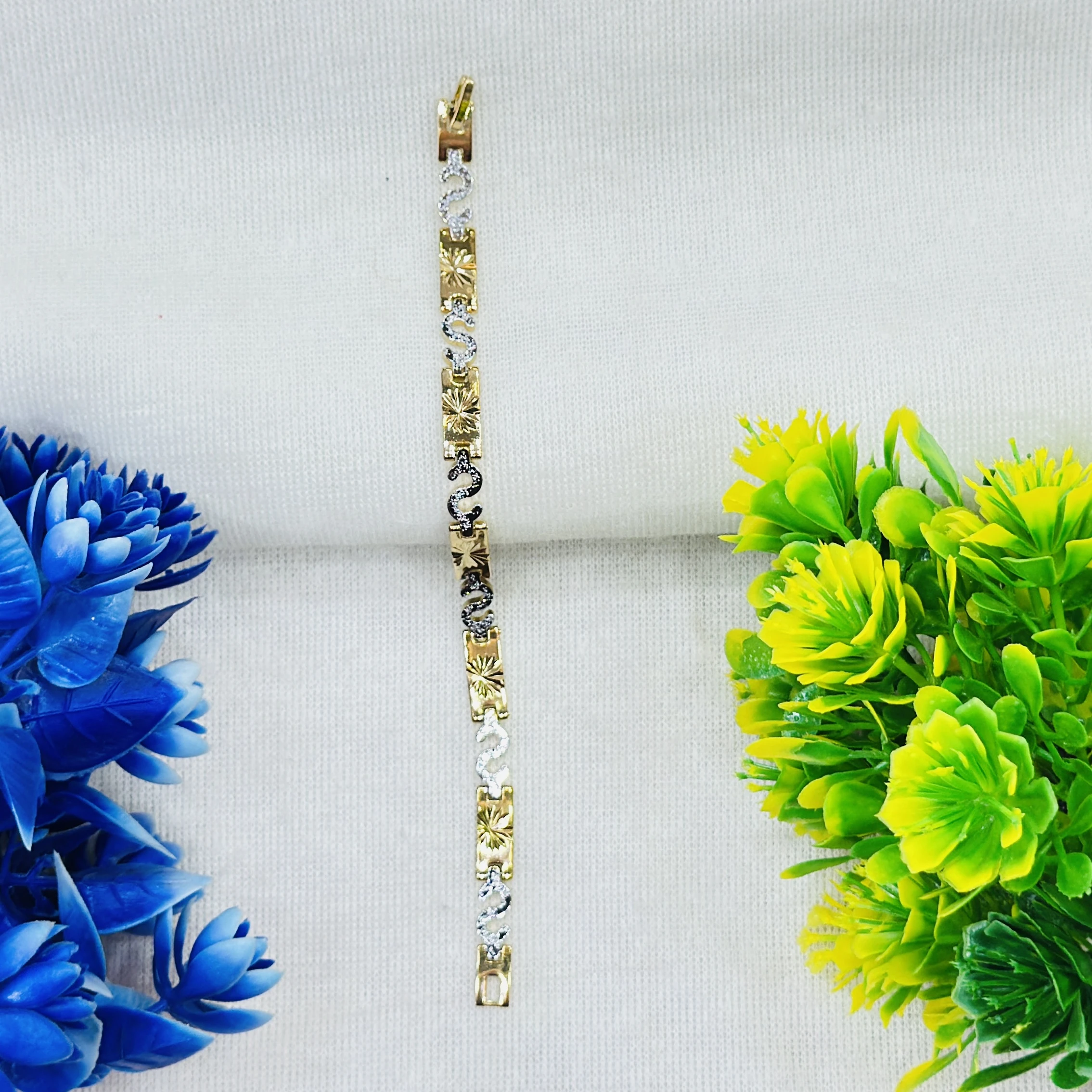 Gold and white metal chain bracelet