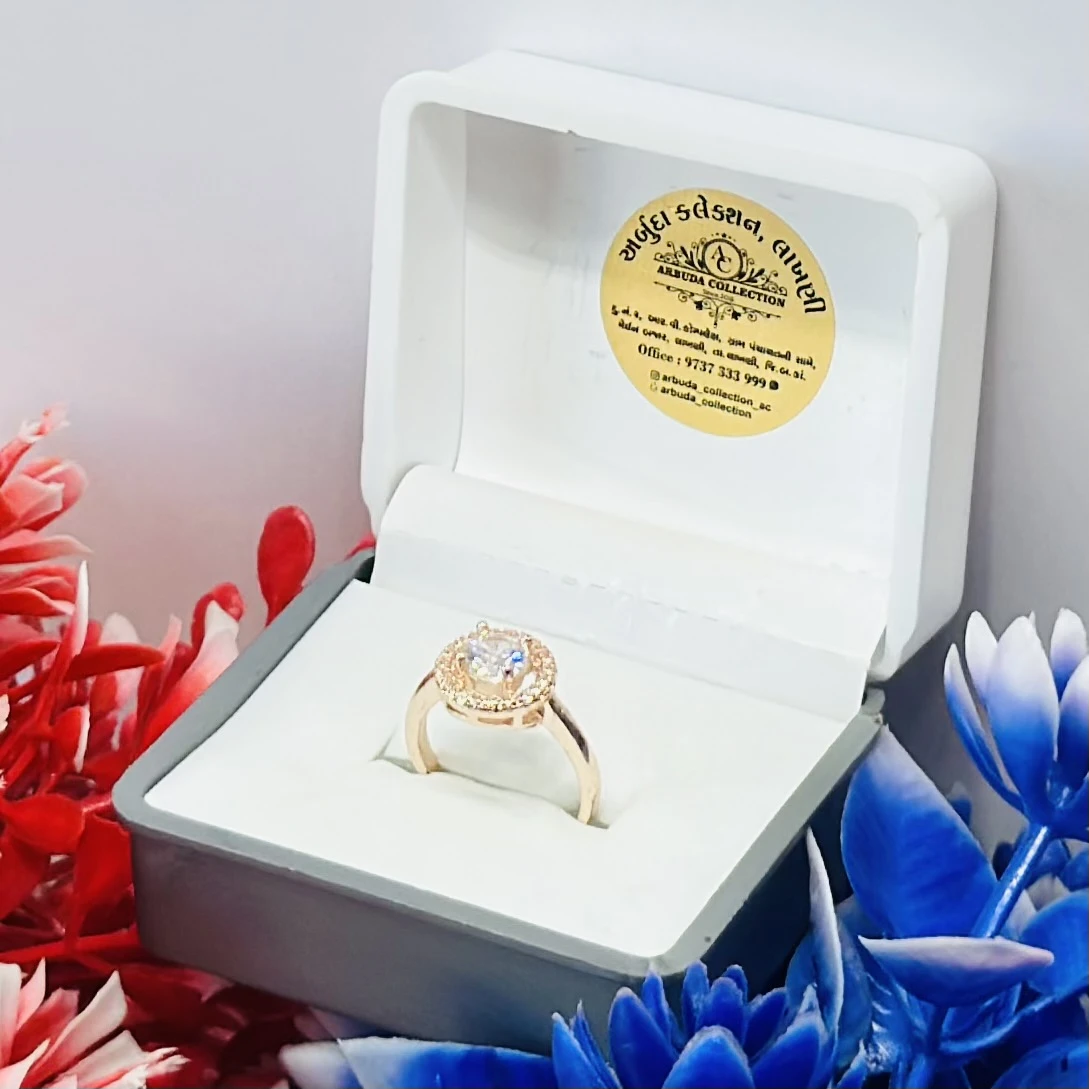 Brass gold-plated CZ stone-studded finger ring.