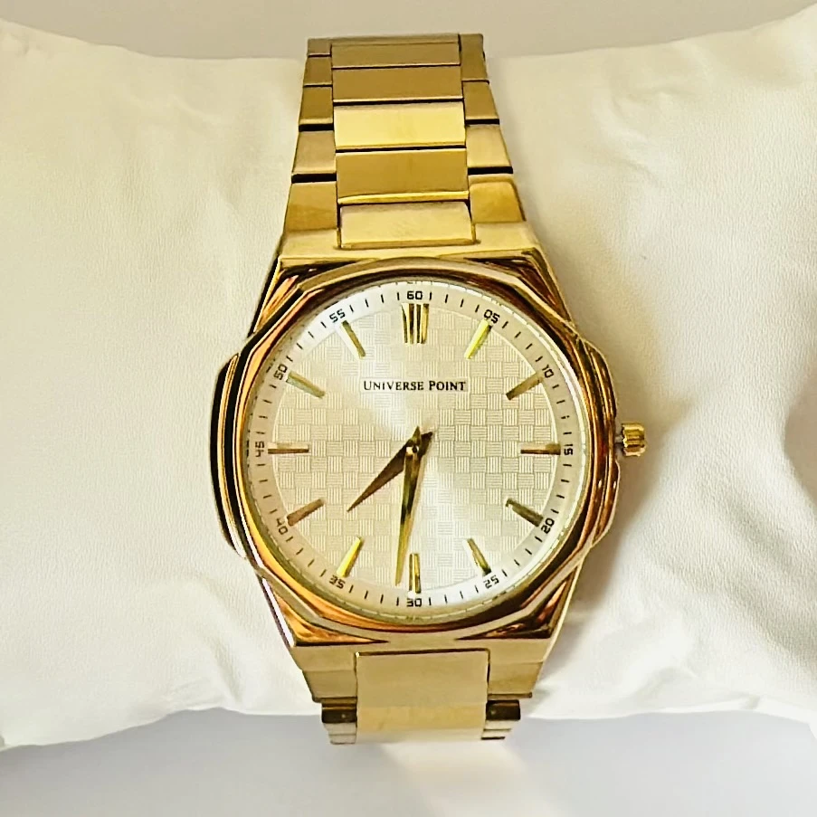 Analog Watch with a golden dial and stainless steel strap