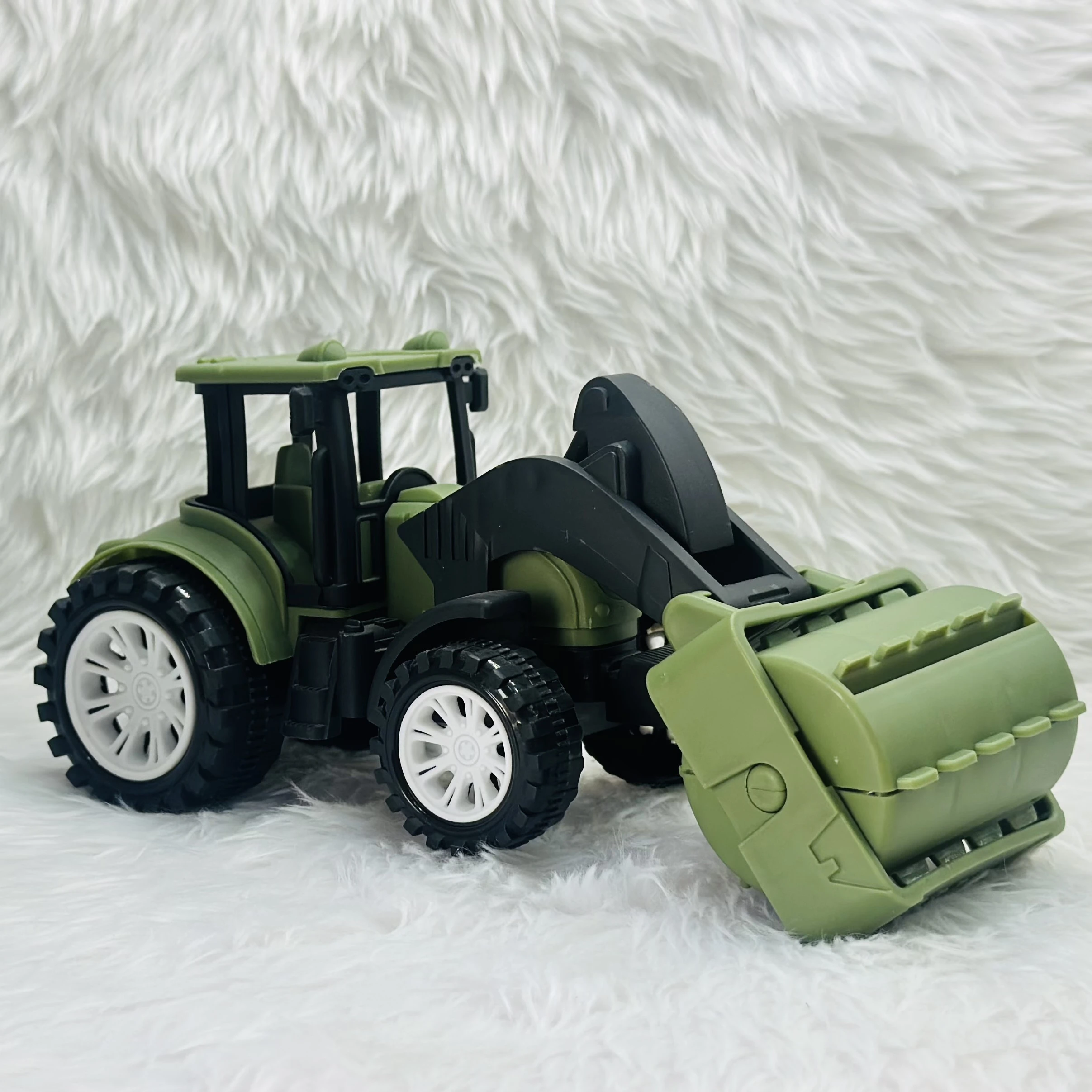 friction-powered road roller toy truck.
