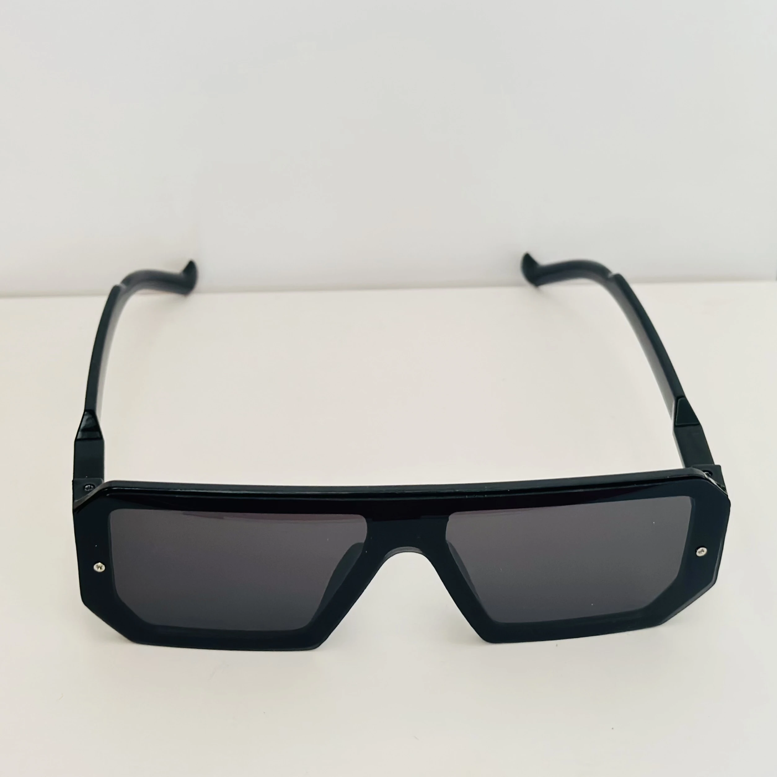 black oversized square flat top sunglasses with a visor design.