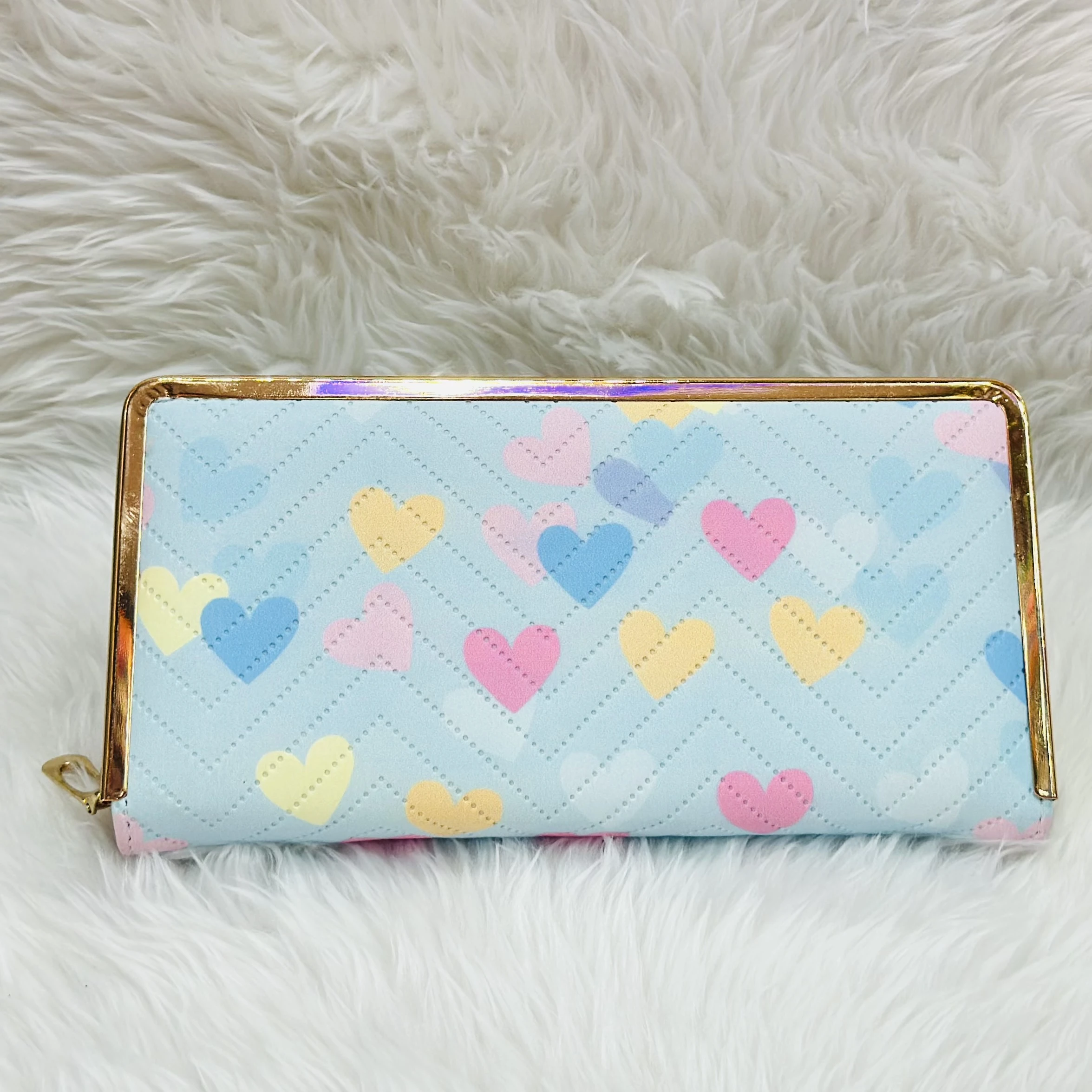 Kyraton women's long wallet with a light blue chevron and multi-colored heart pattern.