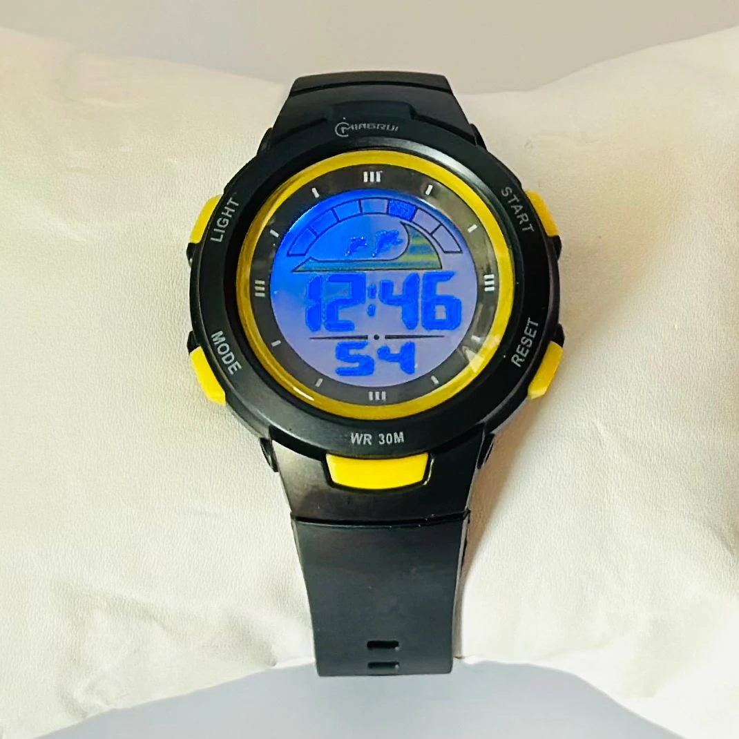 black Mingrui digital sports watch with a plastic or rubber strap.
